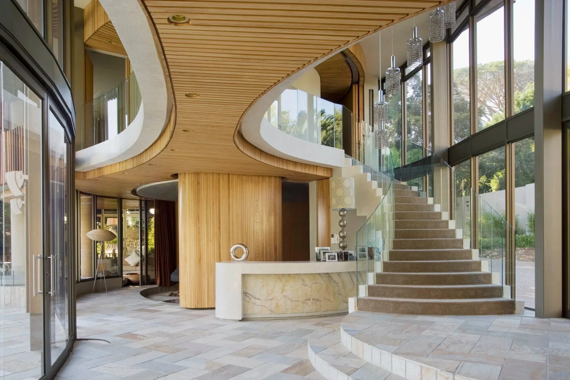 Sculptural wood ceiling cloud installation in a commercial interior