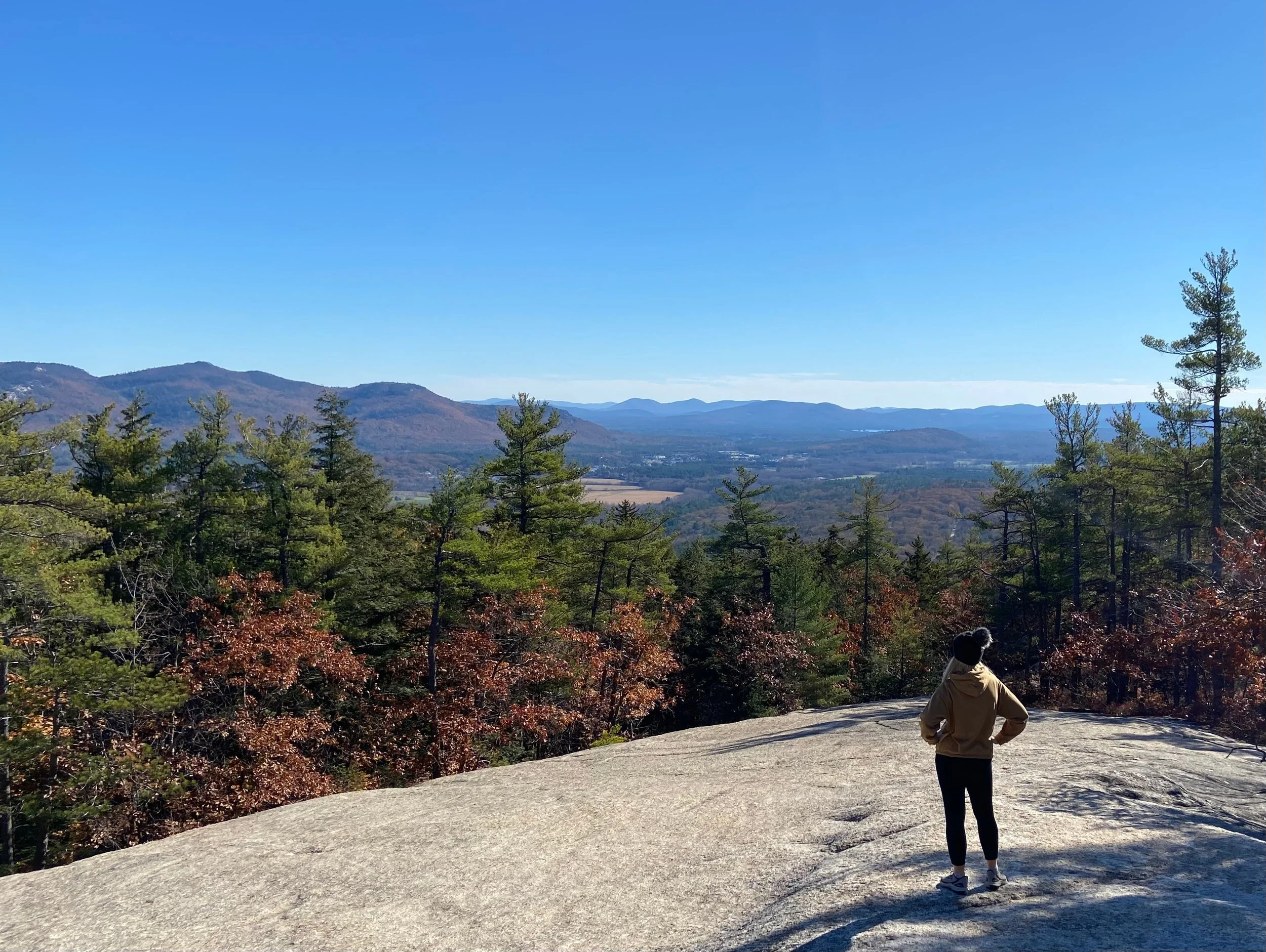 A photo my husband captured of me after we reached the summit of a mountain in Bartlett, New Hampshire.
