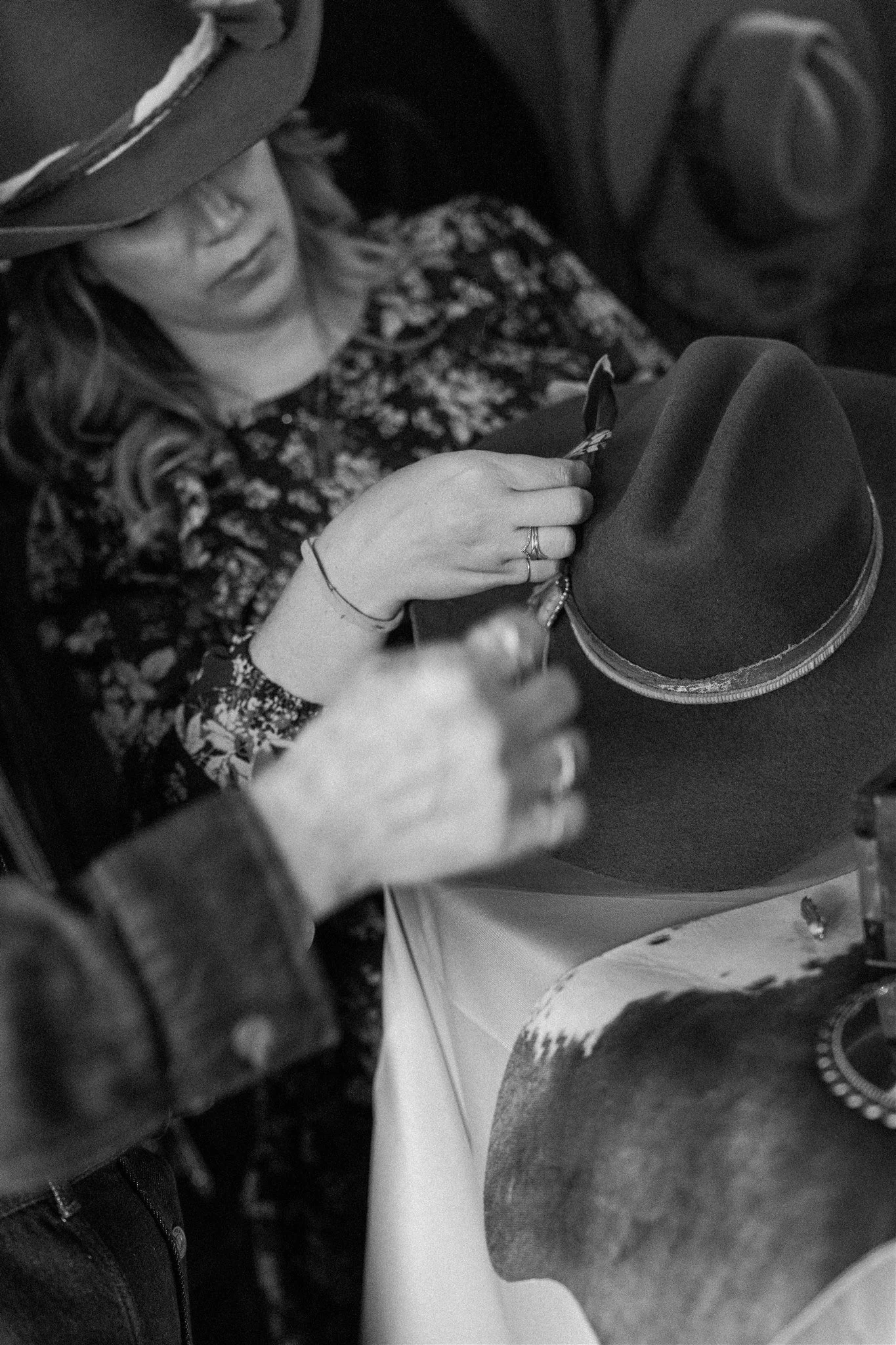 Guests creating custom hats at a Brim & Brand hat bar experience