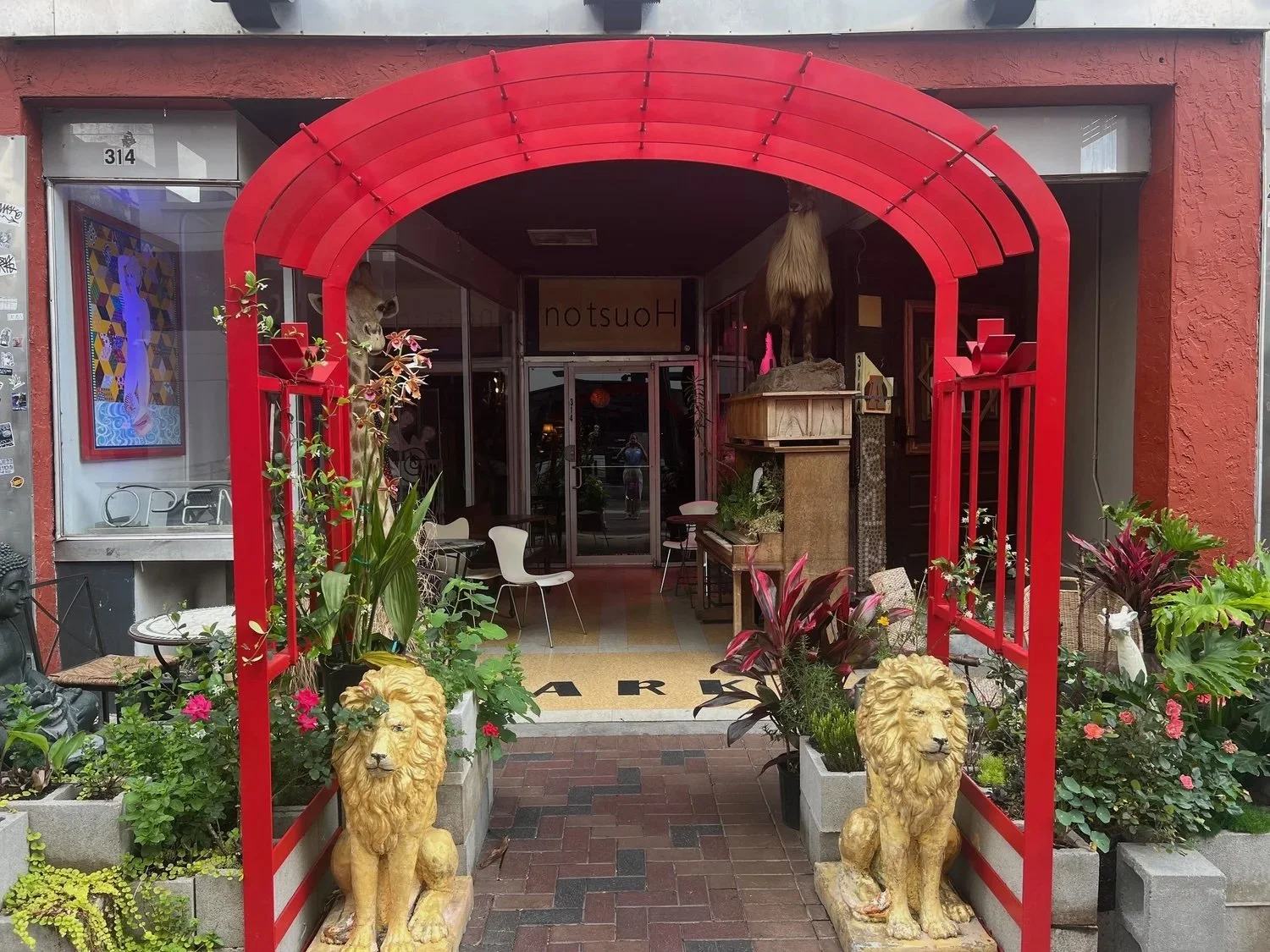 notsuoH_front-door-red-archway.jpeg
