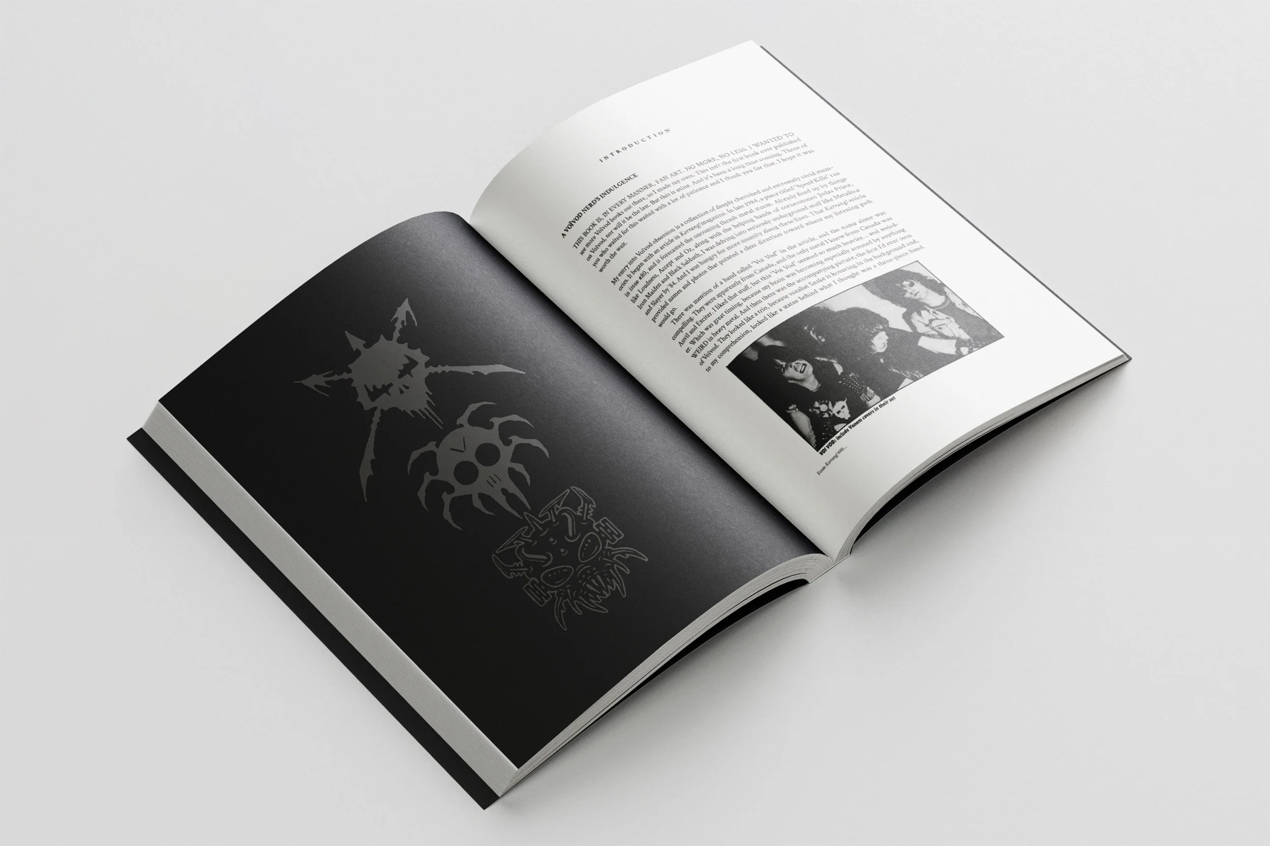 open book spread black left page three skulls author intro chapter