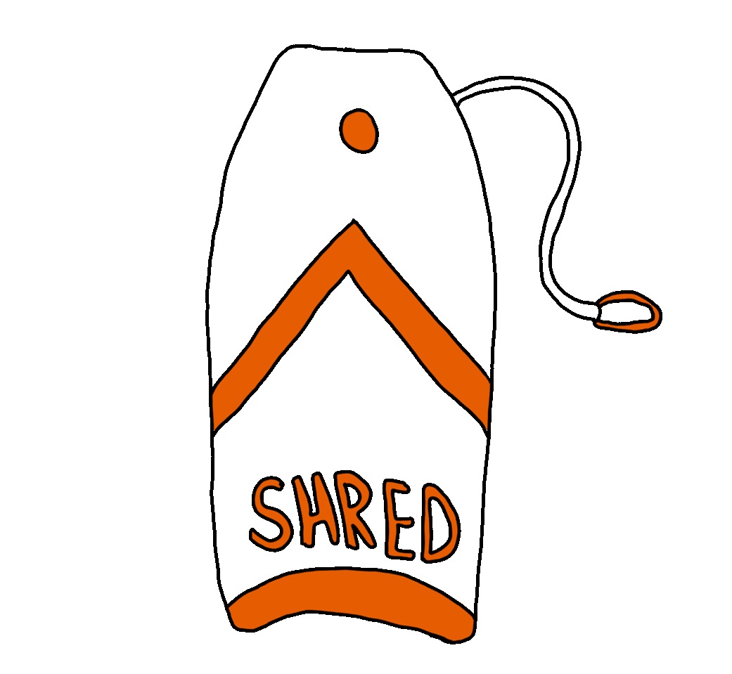 A boogie board that reads "Shred".
