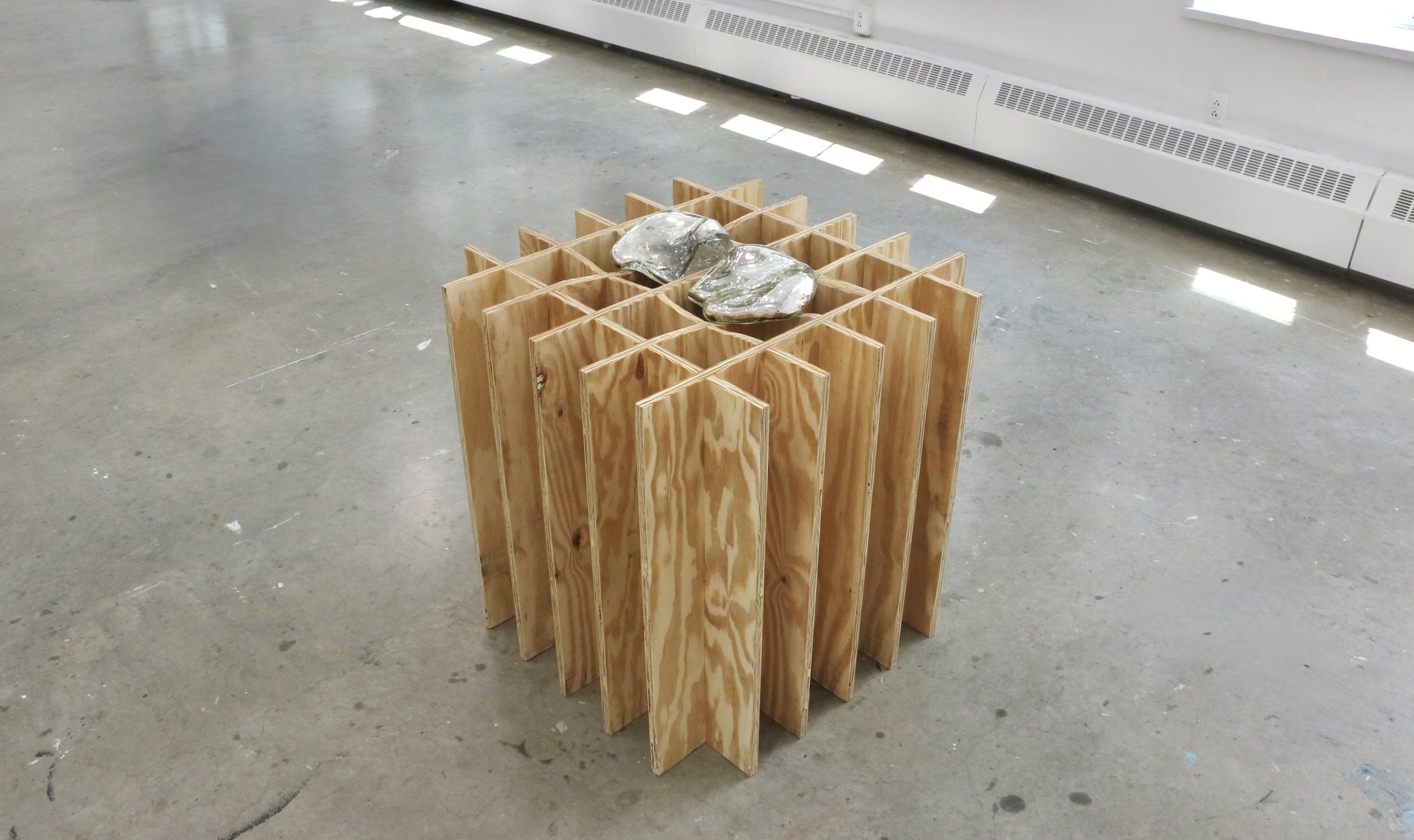 Orientations 3, 2026
30 x 30 x 30 inches

plywood, mold blown glass; mirrored