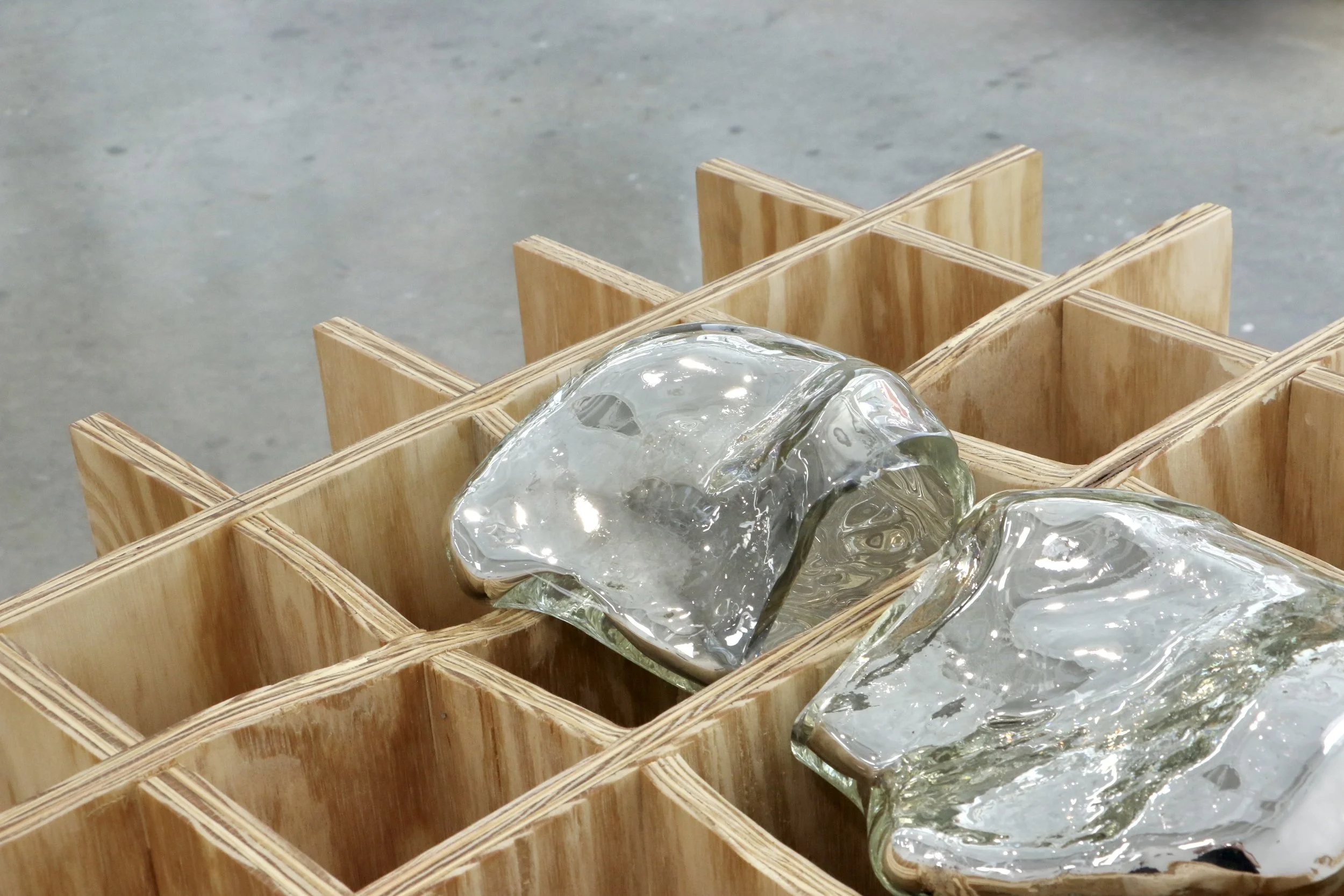 Orientations 3, 2026
30 x 30 x 30 inches

plywood, mold blown glass; mirrored