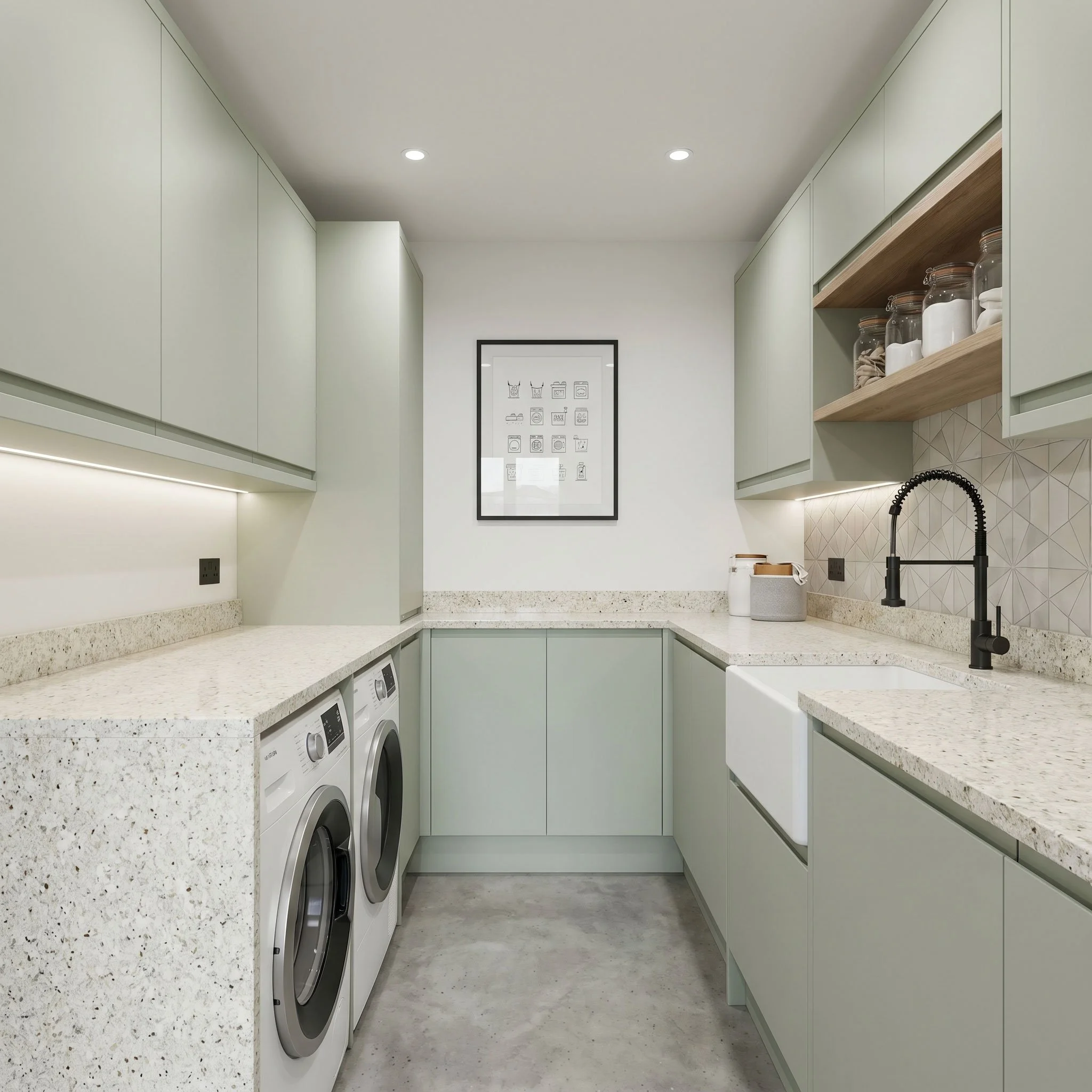Modern laundry room with white cabinets, open shelving with storage jars, black faucet, washing machines, and a framed laundry chart on the wall.