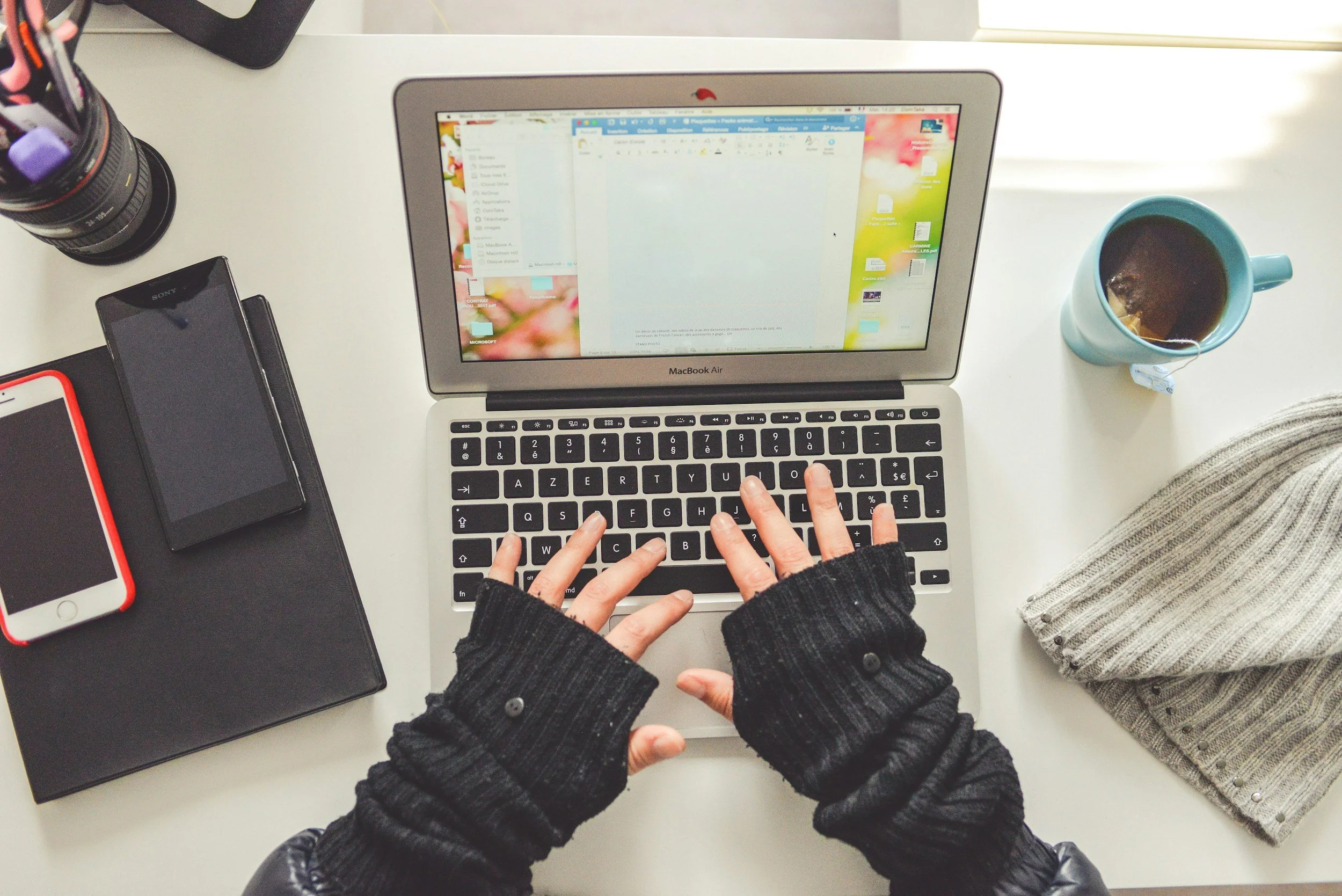 Entrepreneur staying motivated and calm by a bright window during winter