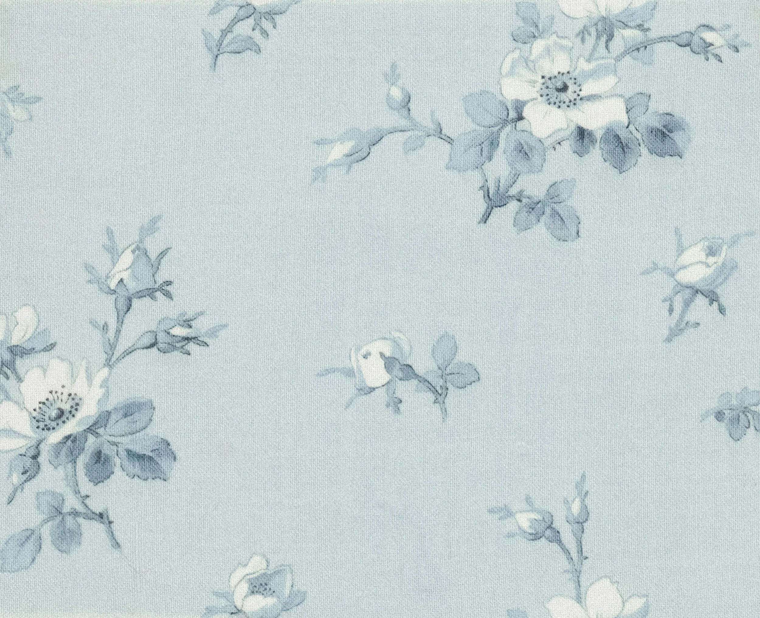 Light blue fabric with a delicate floral pattern featuring white flowers and blue leaves.