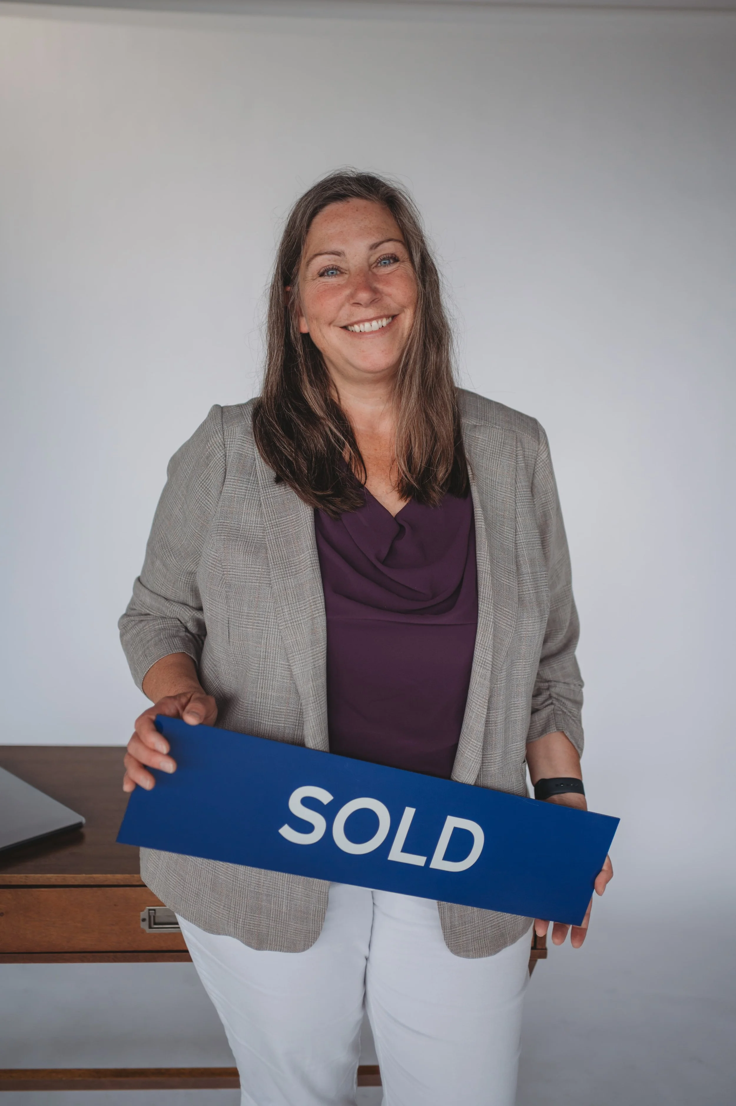 Real Estate agent and coach helping other agents