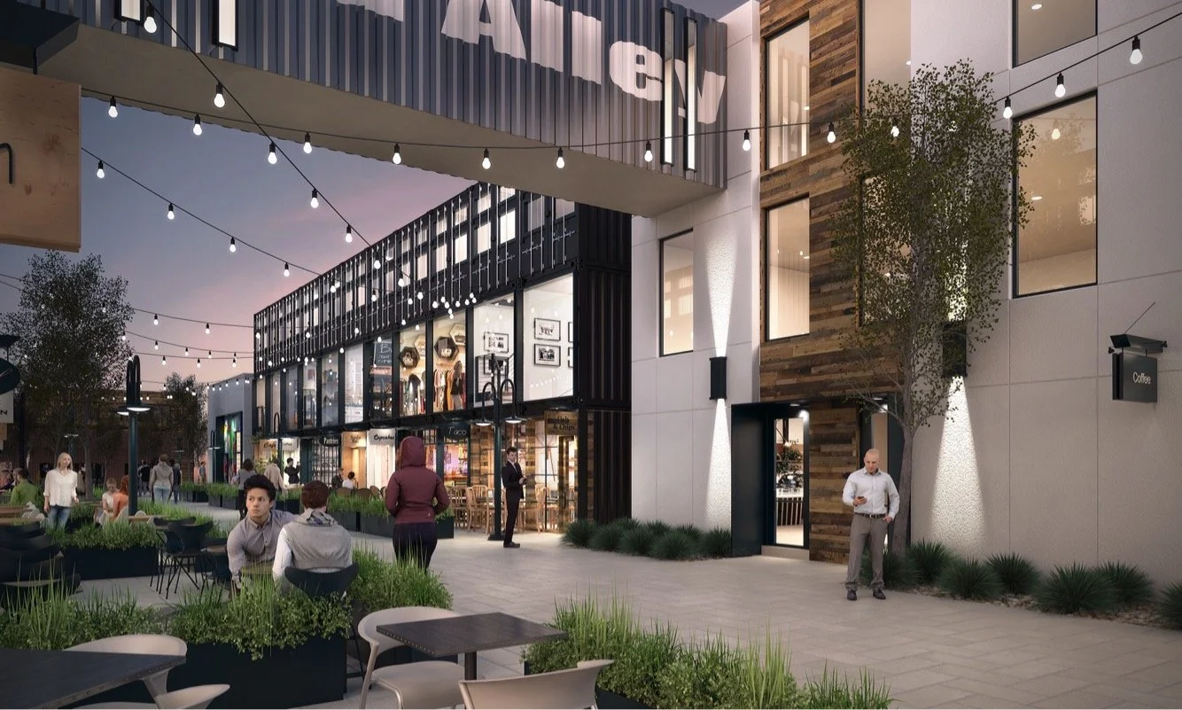 A modern outdoor shopping and dining area at dusk with people walking and sitting at tables, string lights overhead, and storefronts with large windows showcasing various shops.