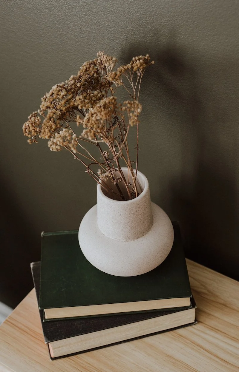 white potholder on top of books