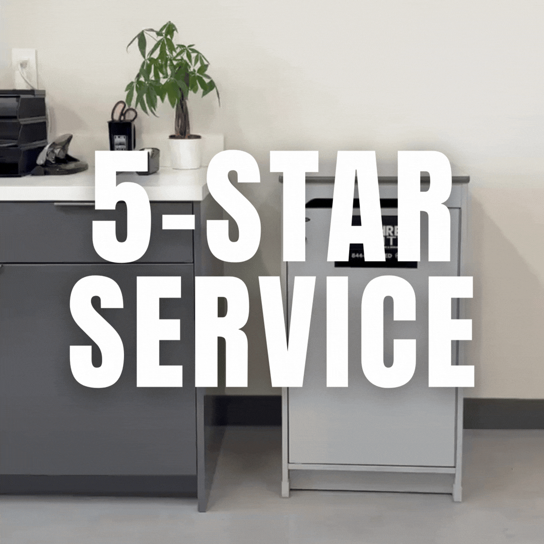 Office reception desk with a potted plant, office supplies, and a sign that reads '5-Star Service'
