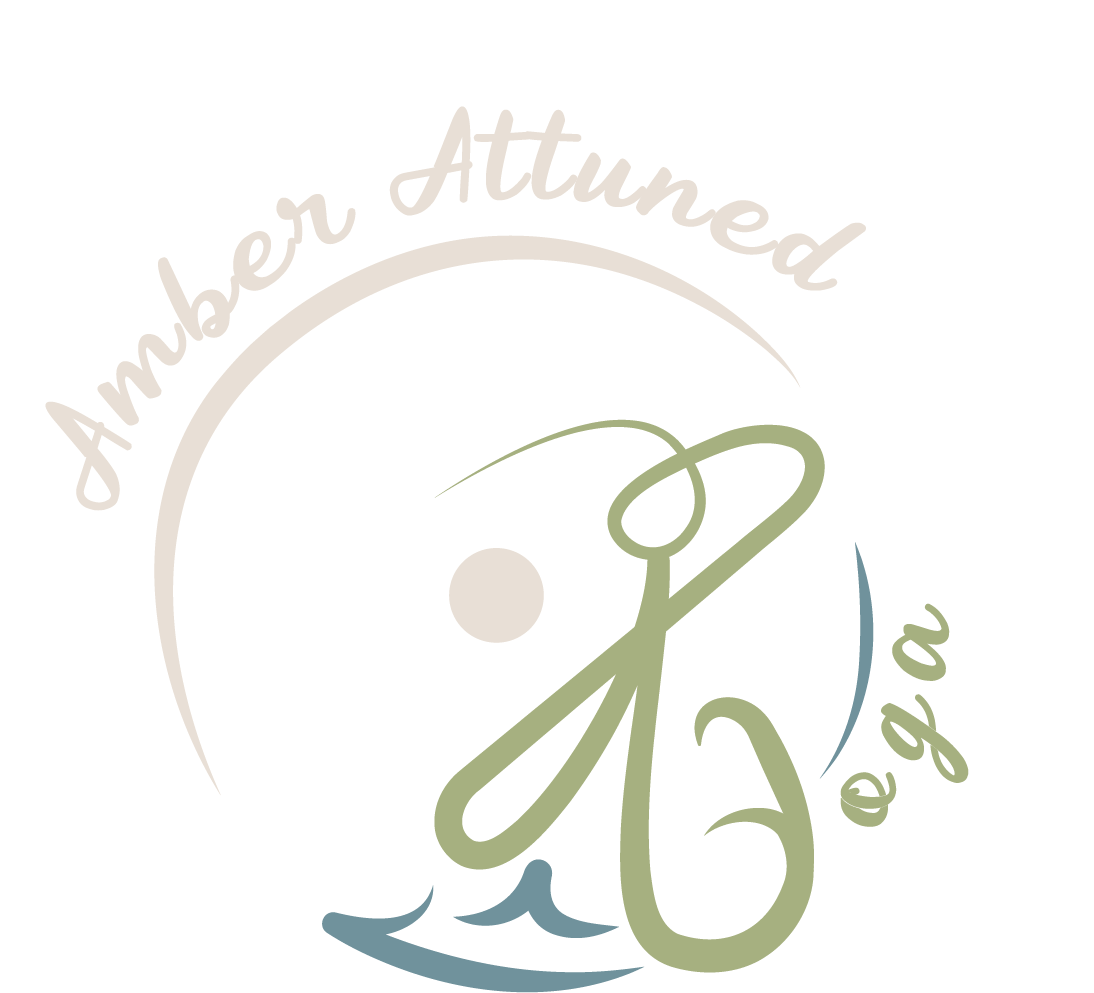 A logo with a stylized grasshopper, a moon, and water waves, along with the text 'Amber Attuned' and '@g'.