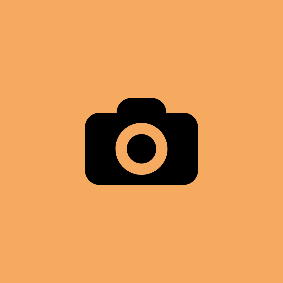 Placeholder for an image, showing a black camera icon on an orange background.