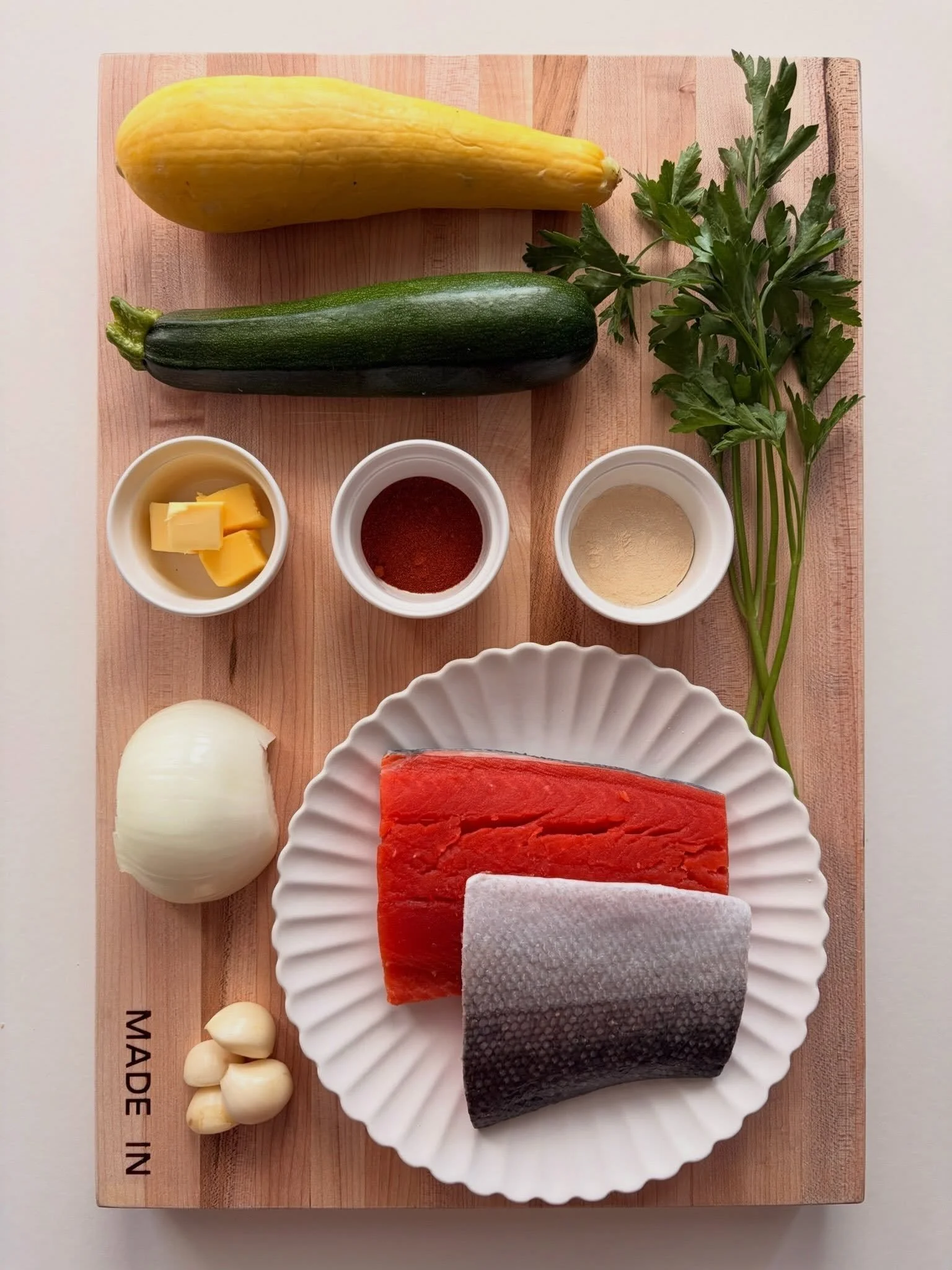 salmon. summer squash. zucchini. butter. paprika. garlic. parsley. 🐟🌿swipe to see how it comes together &rarr;

air fryer foil packet salmon with summer squash &amp; zucchini 🐟🌿
.
.
.
full recipe with step by step instructions at nomsbyjackie.com