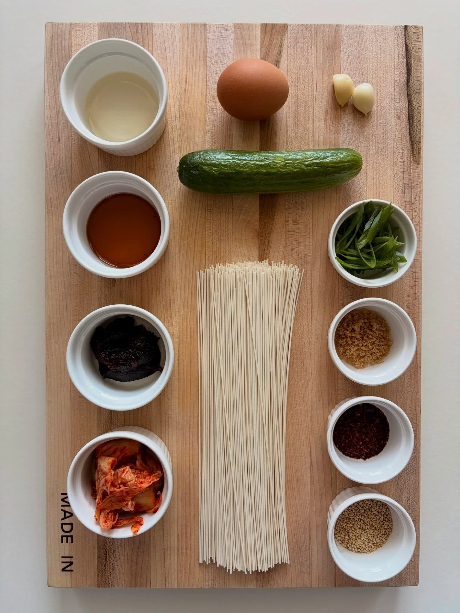 somyeon. gochujang. soy sauce. rice vinegar. brown sugar. gochugaru. garlic. cucumber. kimchi. egg. green onion. sesame seeds. 🍜🌶️ swipe to see how it comes together &rarr;

bibim guksu 🍜
.
.
.
full recipe with step by step instructions at nomsbyj