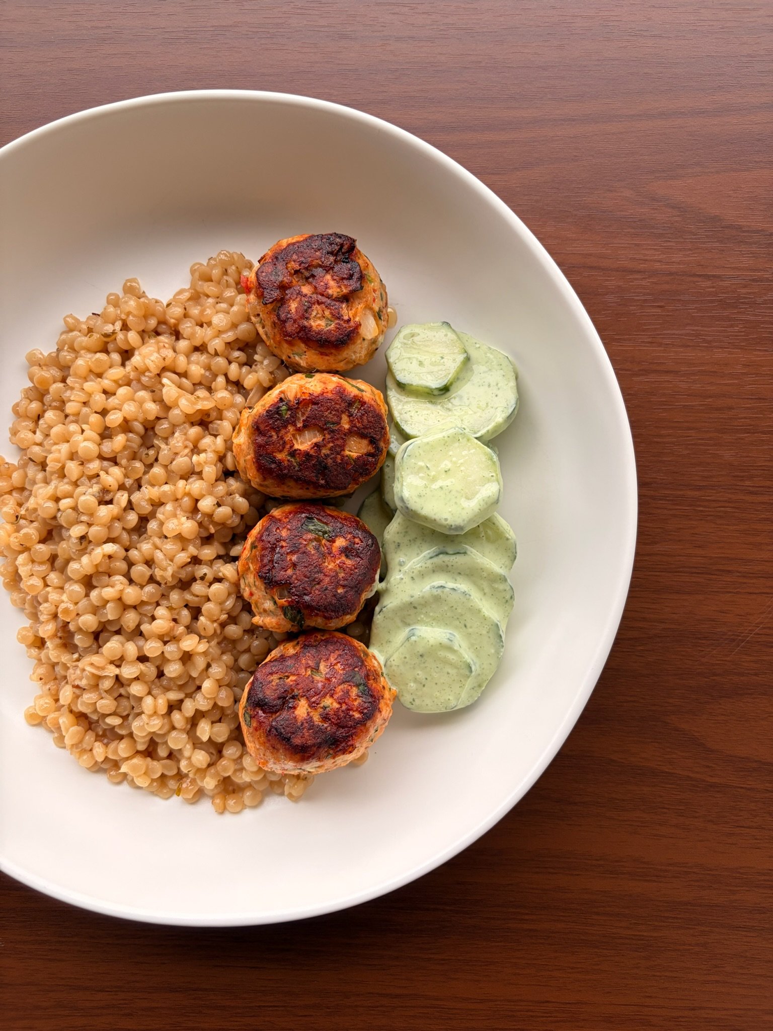 Harissa Chicken Meatballs with Couscous &amp; Lemony Herb Yogurt Sauce