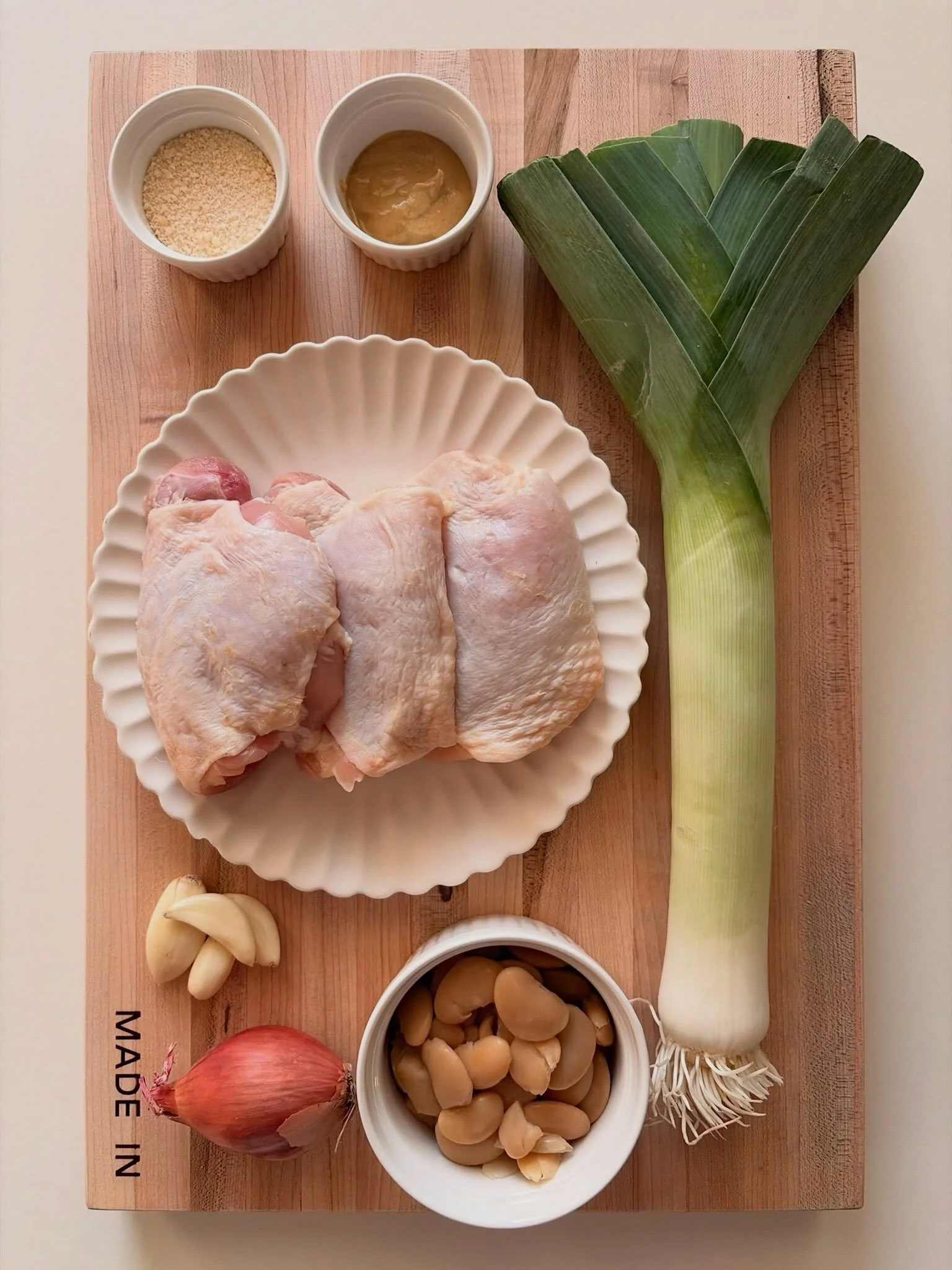 chicken thighs. leeks. shallot. garlic. dijon mustard. butter beans. white wine. oregano. red pepper flakes. 🍗🧈 swipe to see how it comes together &rarr;

pan seared chicken with butter beans &amp; leeks 🍗
.
.
.
full recipe with step by step instr