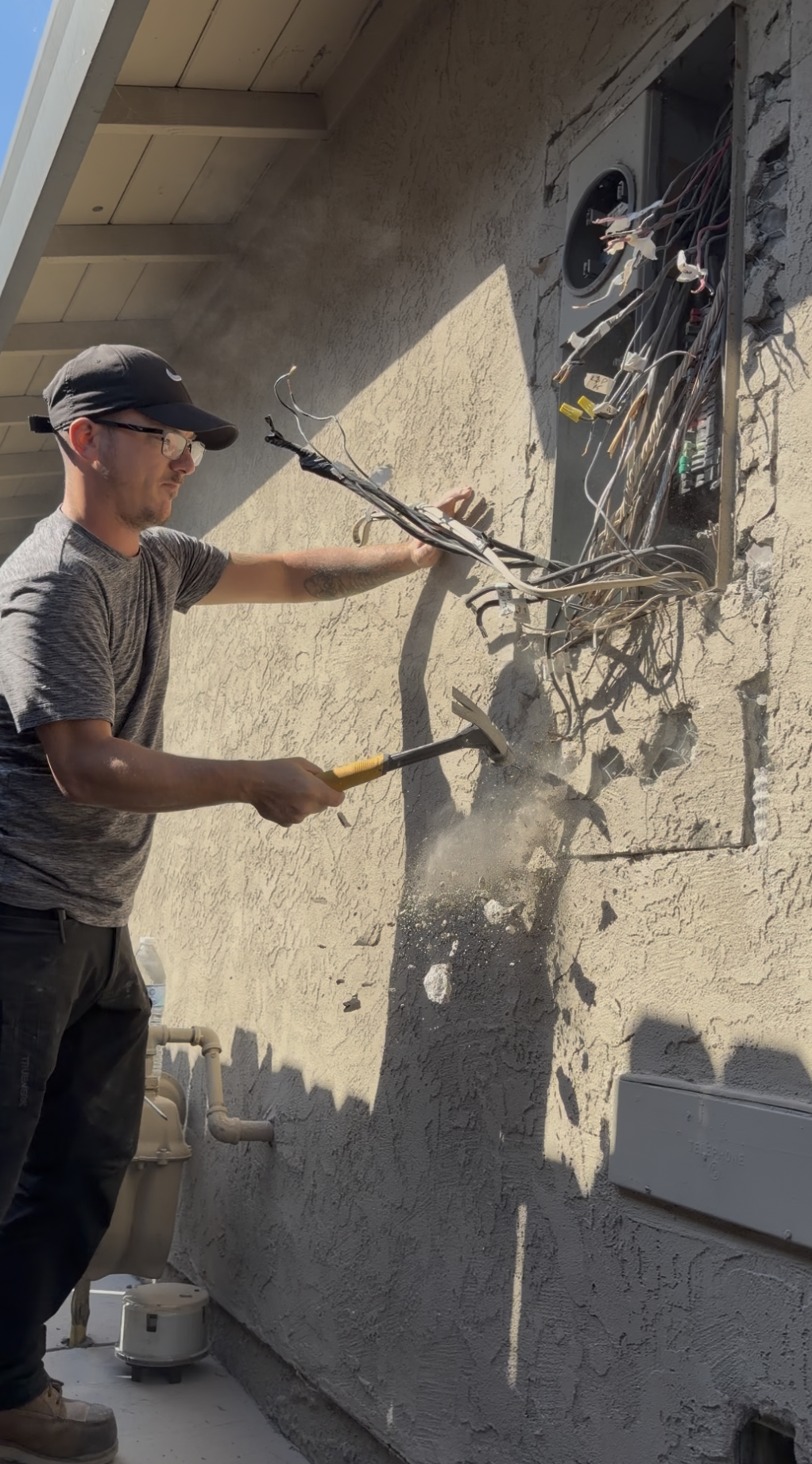 Stop! Hammer Time! Panel demolition during 200-amp service upgrade