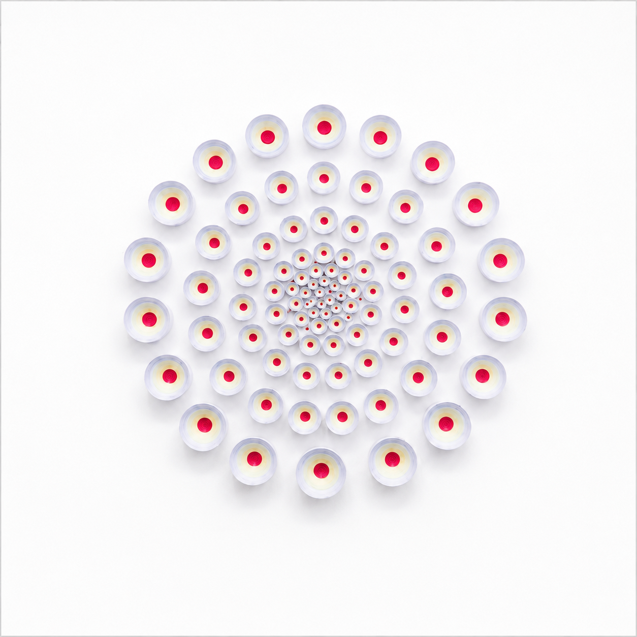 A geometric pattern of rotating white and red-capped test tubes arranged in a spiral on a white background.