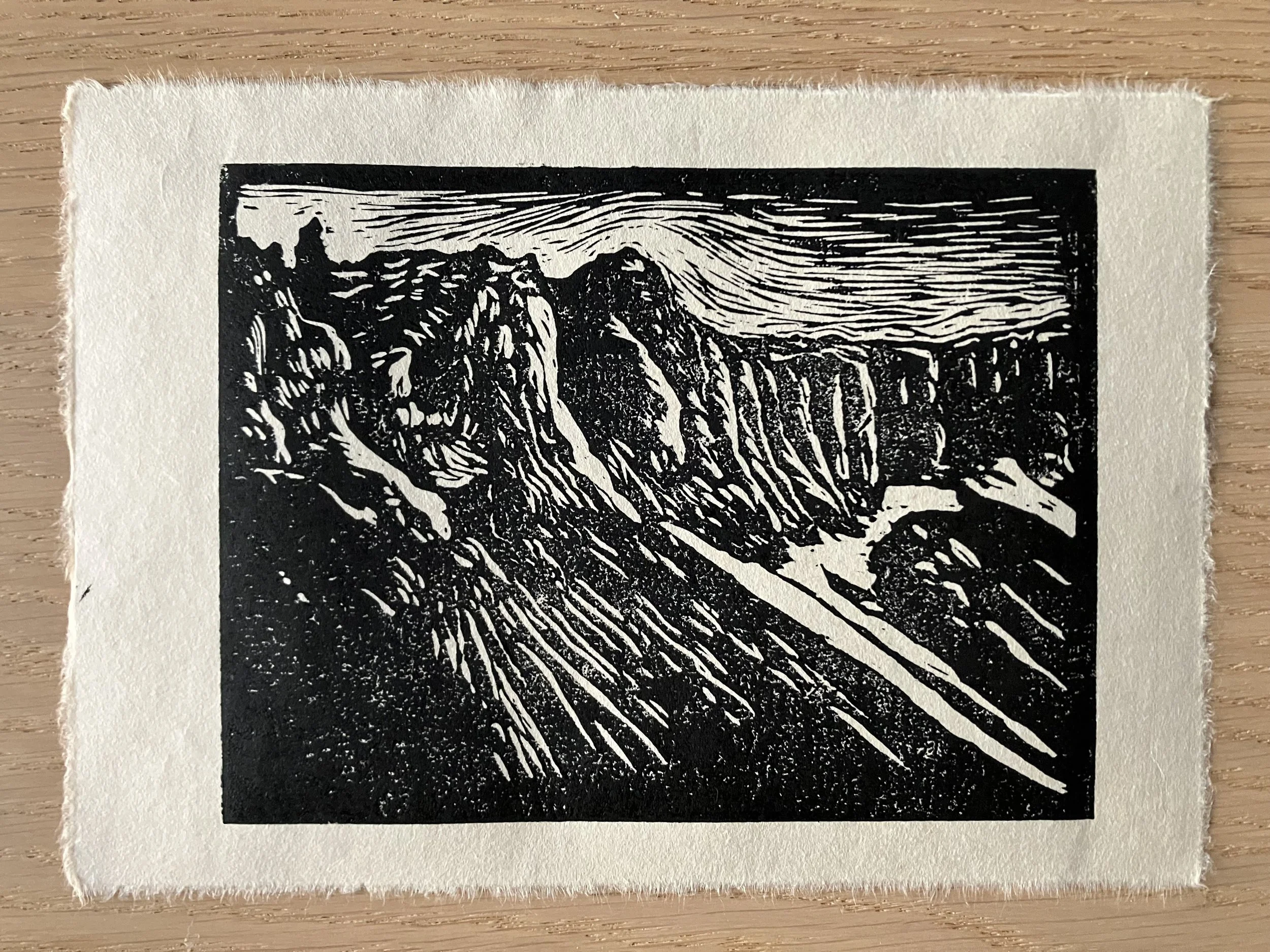 Black-and-white woodcut of a mountain range in Skaftafell, Iceland.
