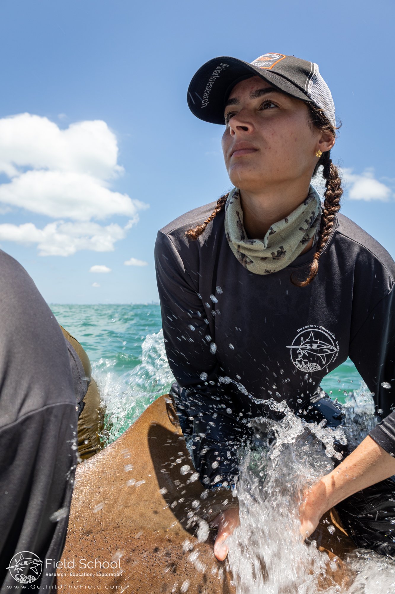 Field School intern Sophia Santomero handling a nurse shark