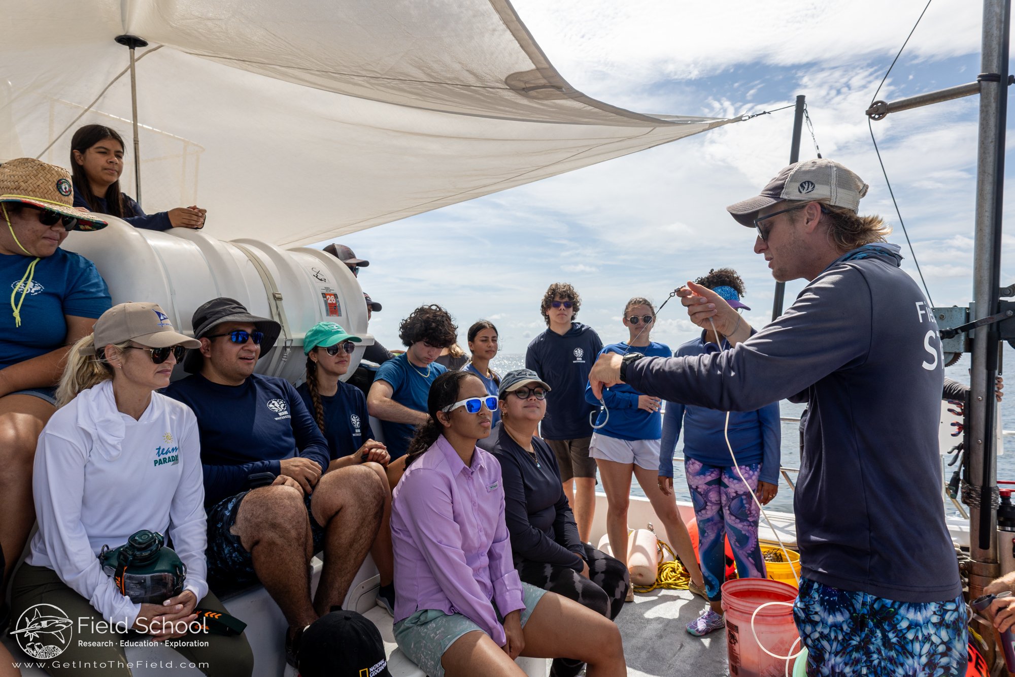 Jake Jerome explaining fishing gear used at Field School to Miami Waterkeeper's junior ambassadors