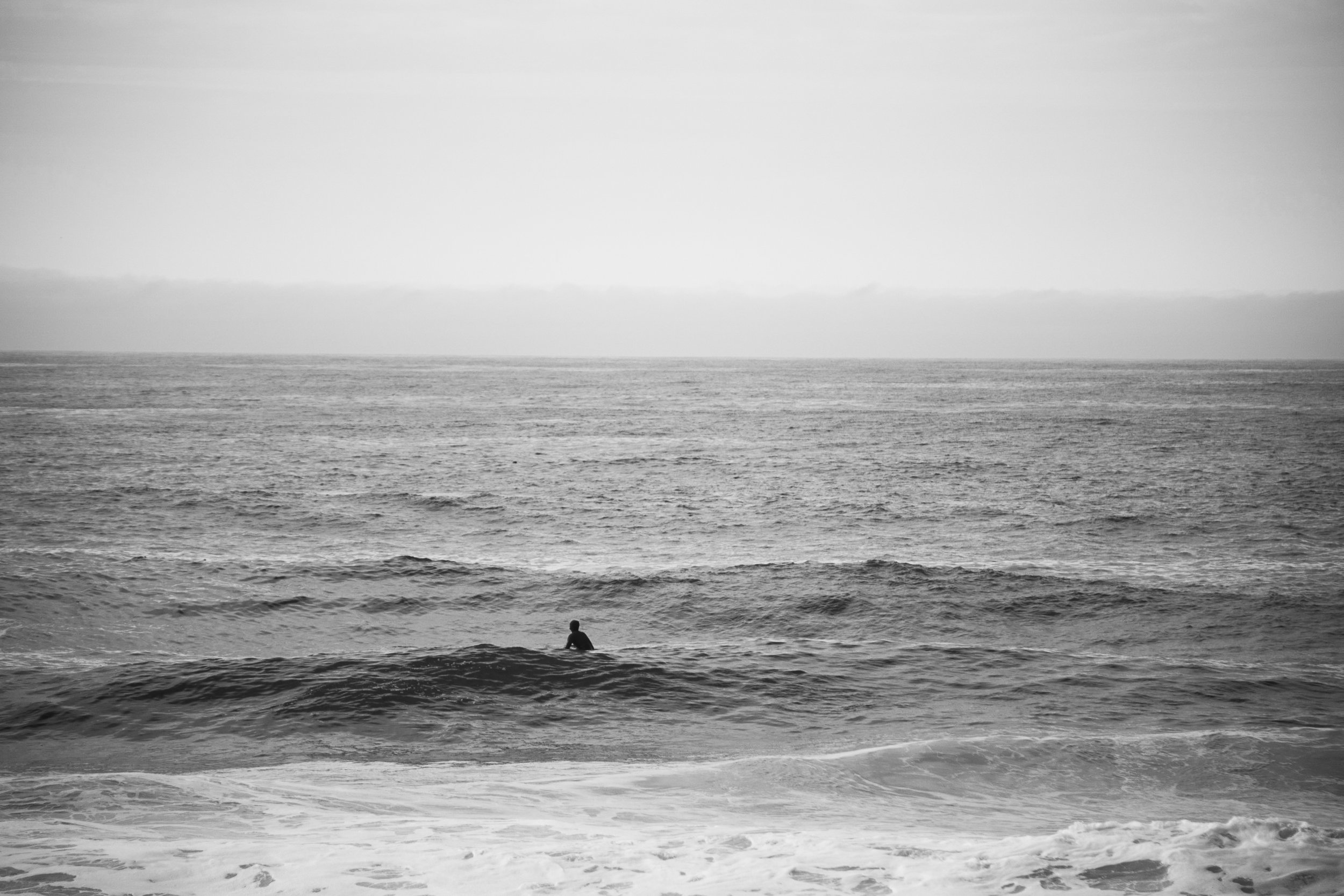 surfer-ocean-black-white-photography.jpg