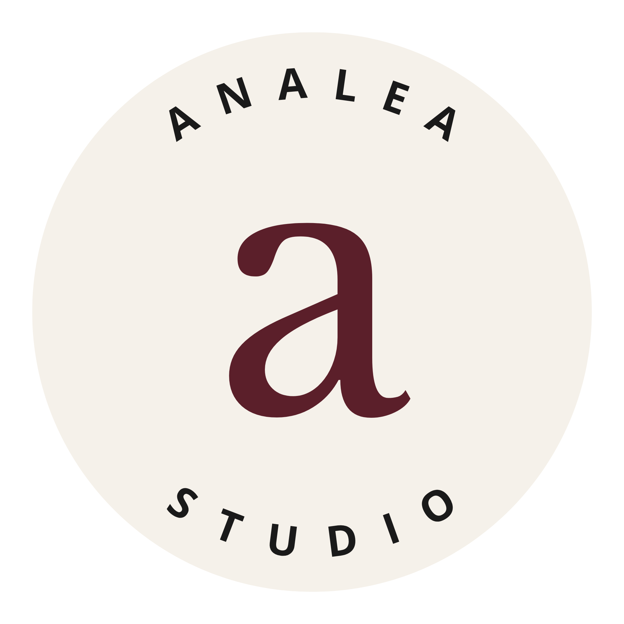 Close-up of a circular coffee table with the words 'ANALOG STUDIOS' partially visible around the top edge.
