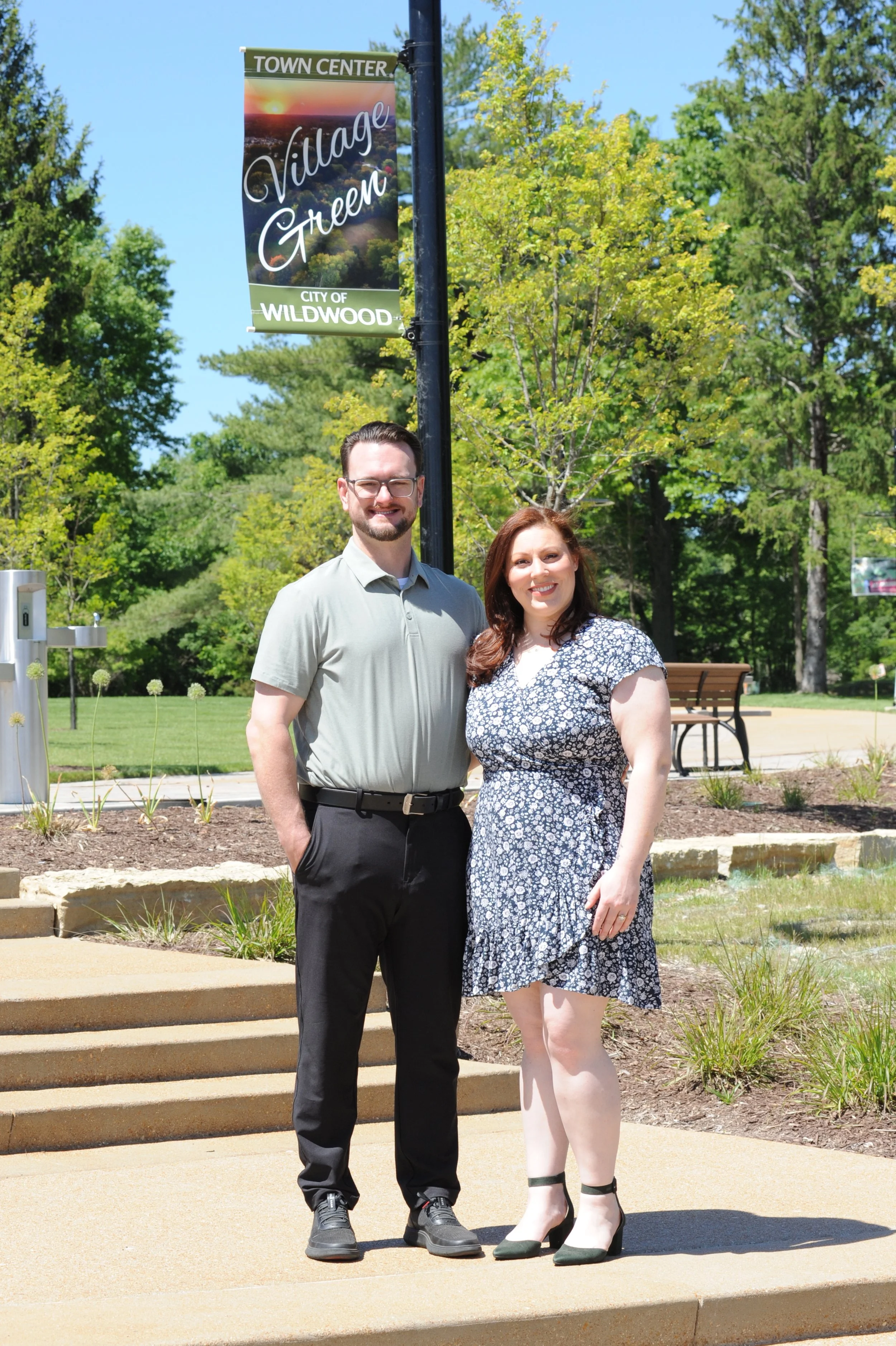Marvel Health Concepts leadership team—Lead Clinic Doctor and Lead Clinic Director—standing outdoors on a sunny day in Wildwood, Missouri, representing community-centered care, trust, and a welcoming presence in local wellness.
