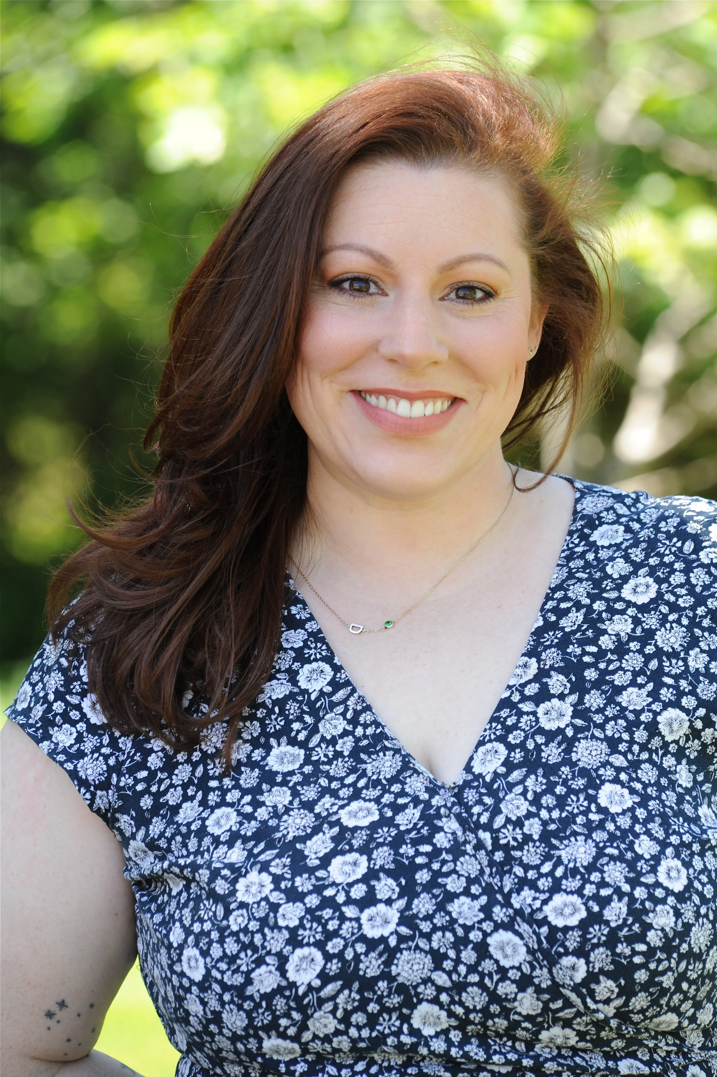 Brittney, lead clinic director, supporting patient journeys and fostering a warm, family-centered environment focused on care and connection.