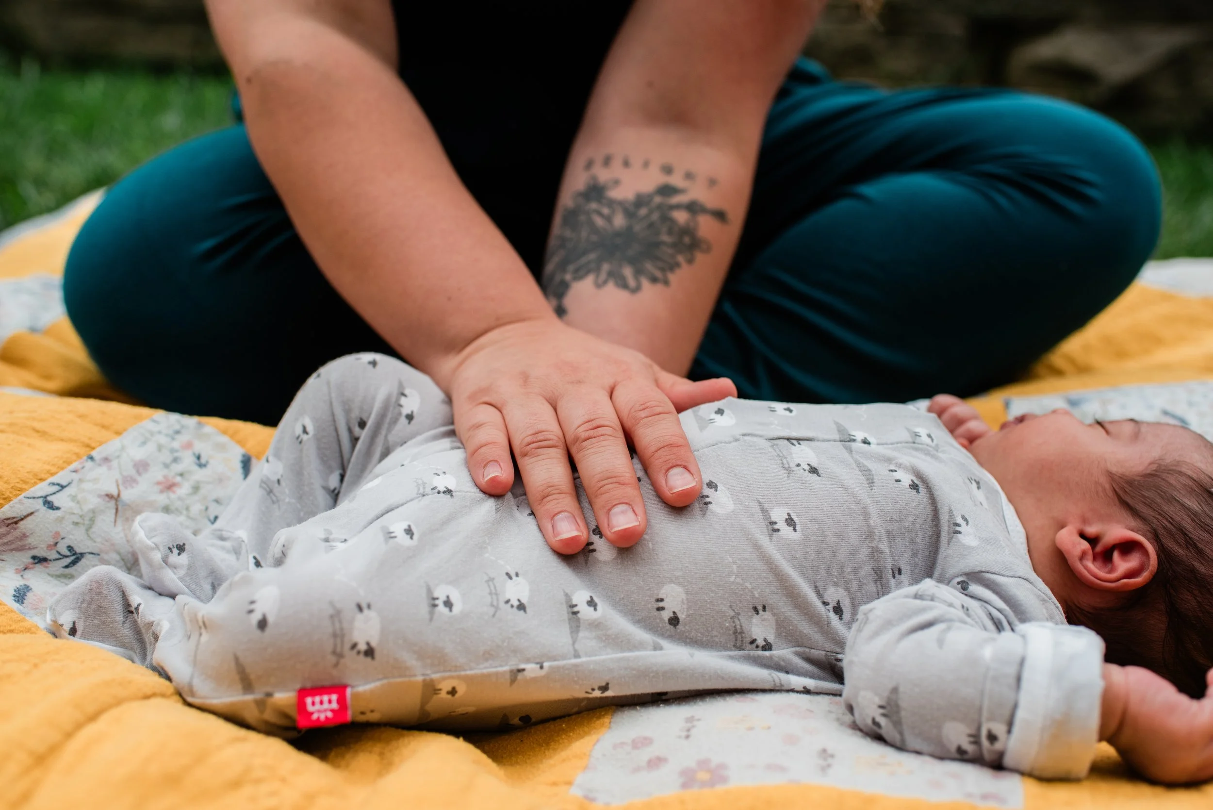 Kayla providing gentle CFT bodywork through Sol Lactation & Wellness