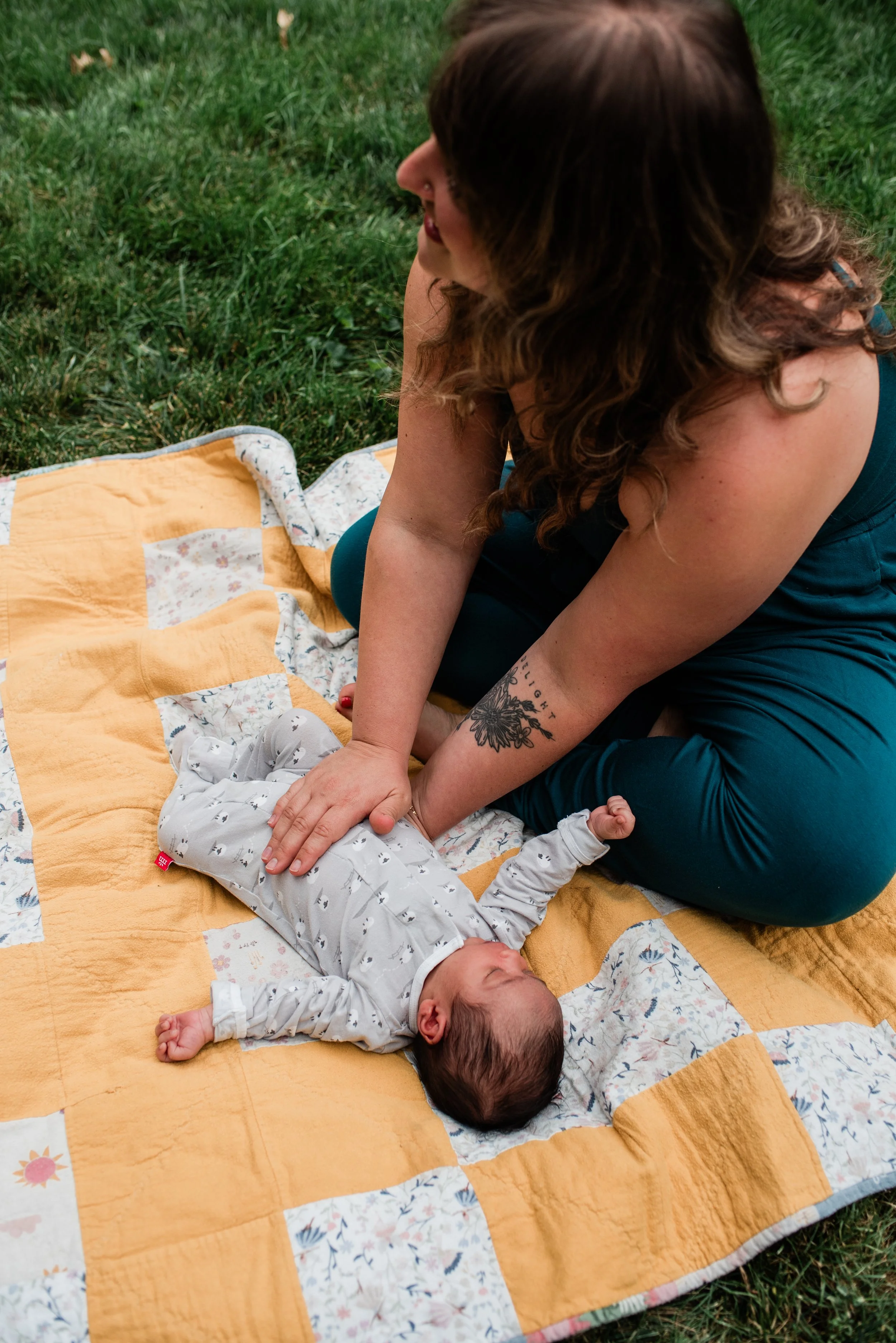 Kayla providing gentle Infant Craniosacral Fascial Therapy during an in-home visit