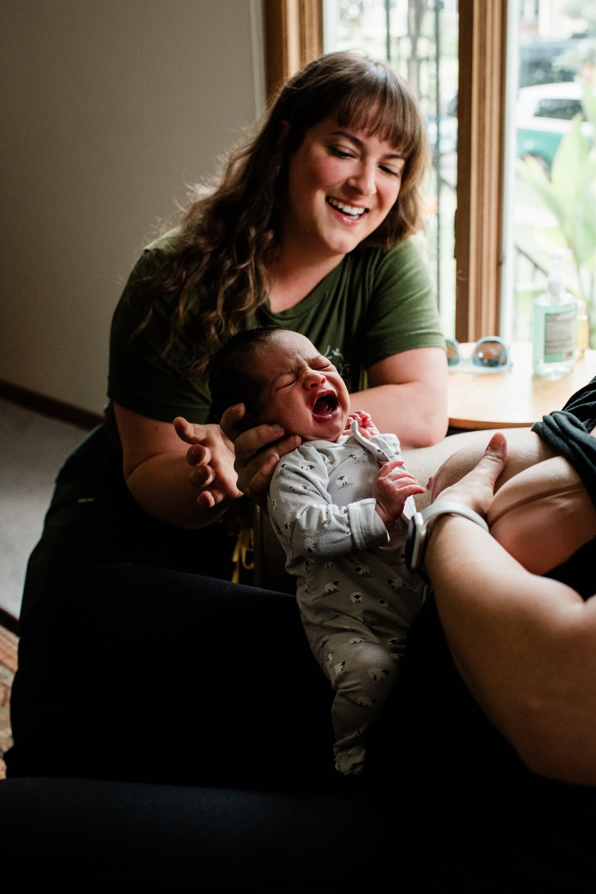 Kayla Roth, RN, IBCLC, providing in-home lactation support in Minneapolis