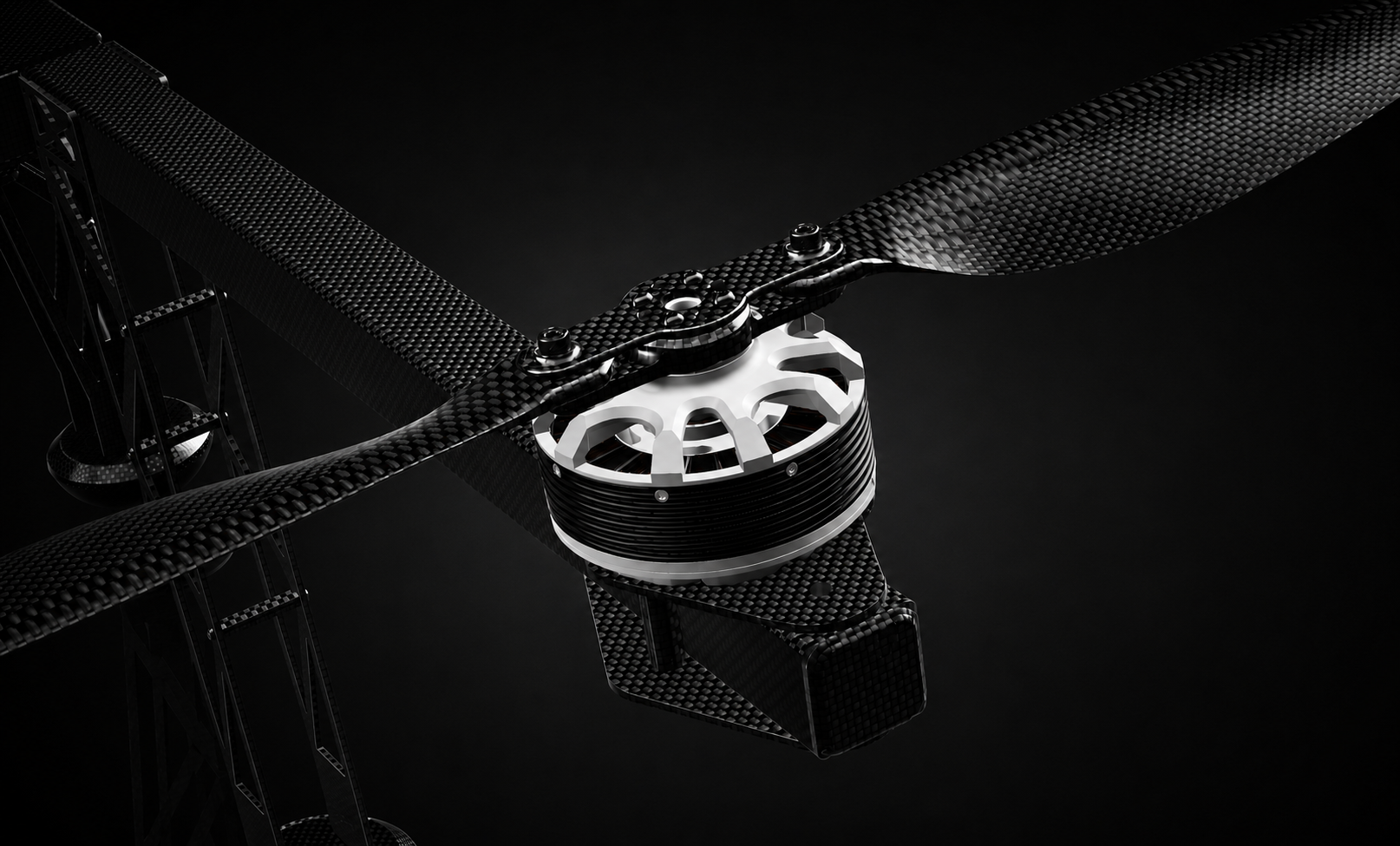 Close-up of a drone with carbon fiber arms and a central motor, set against a black background.