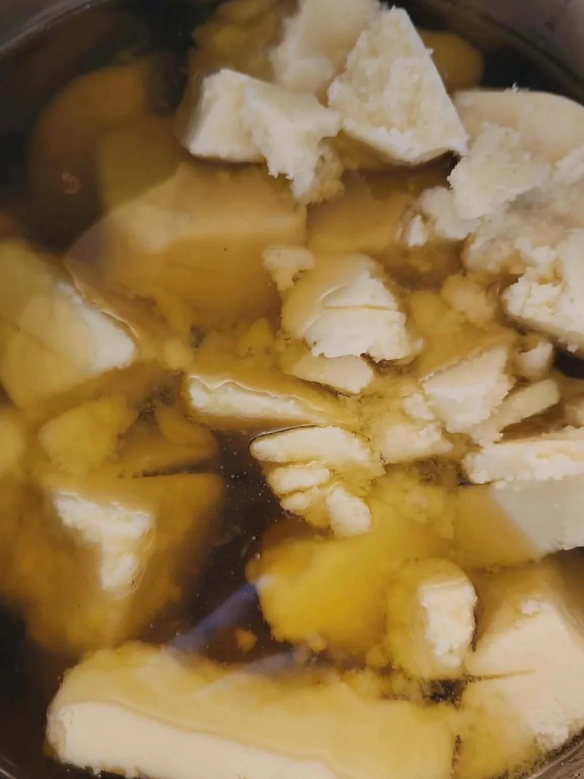 Chunks of tallow melting