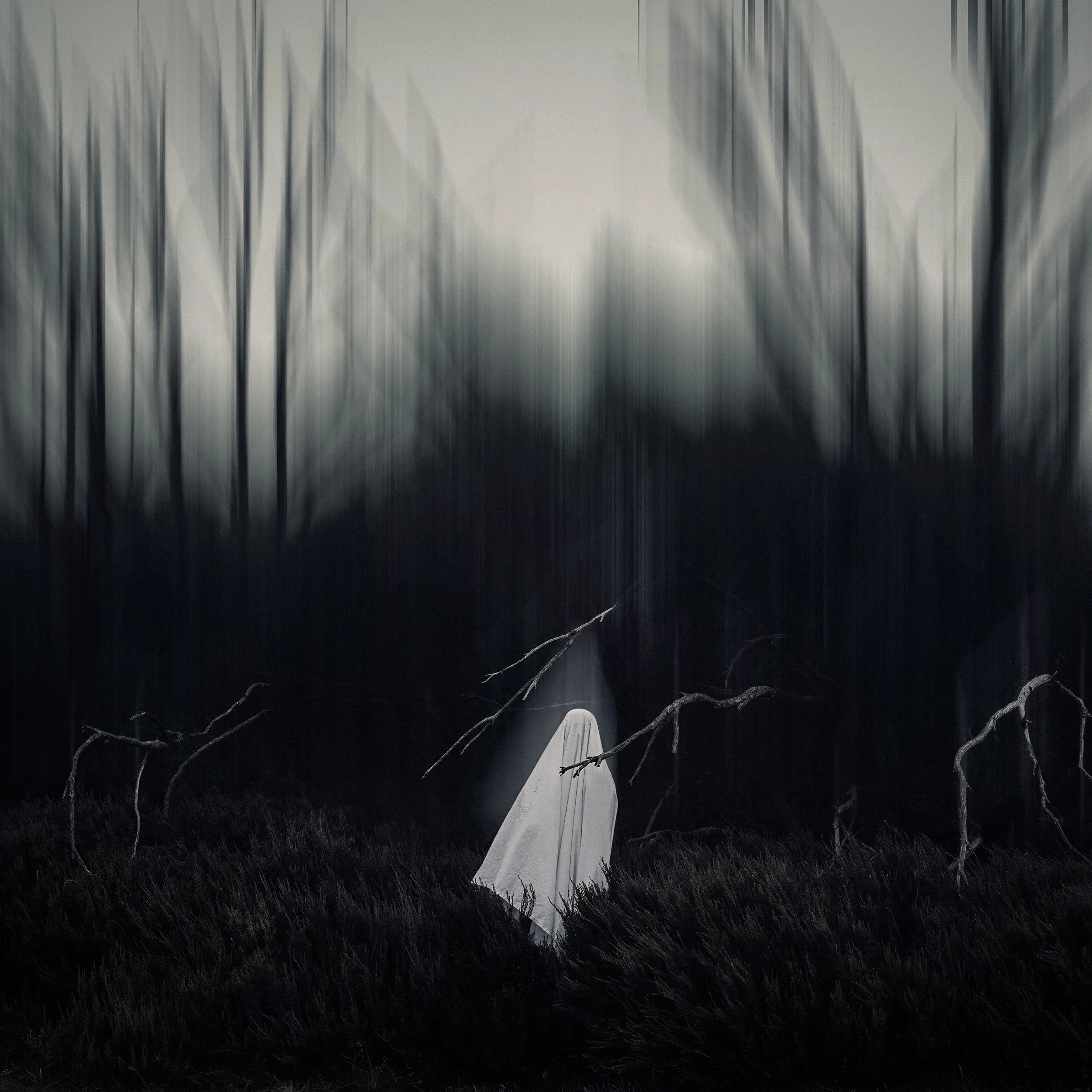 A surreal landscape with a black sky, leafless trees, tall grass, a small white tent in the center, and a figure in white standing near the tent.