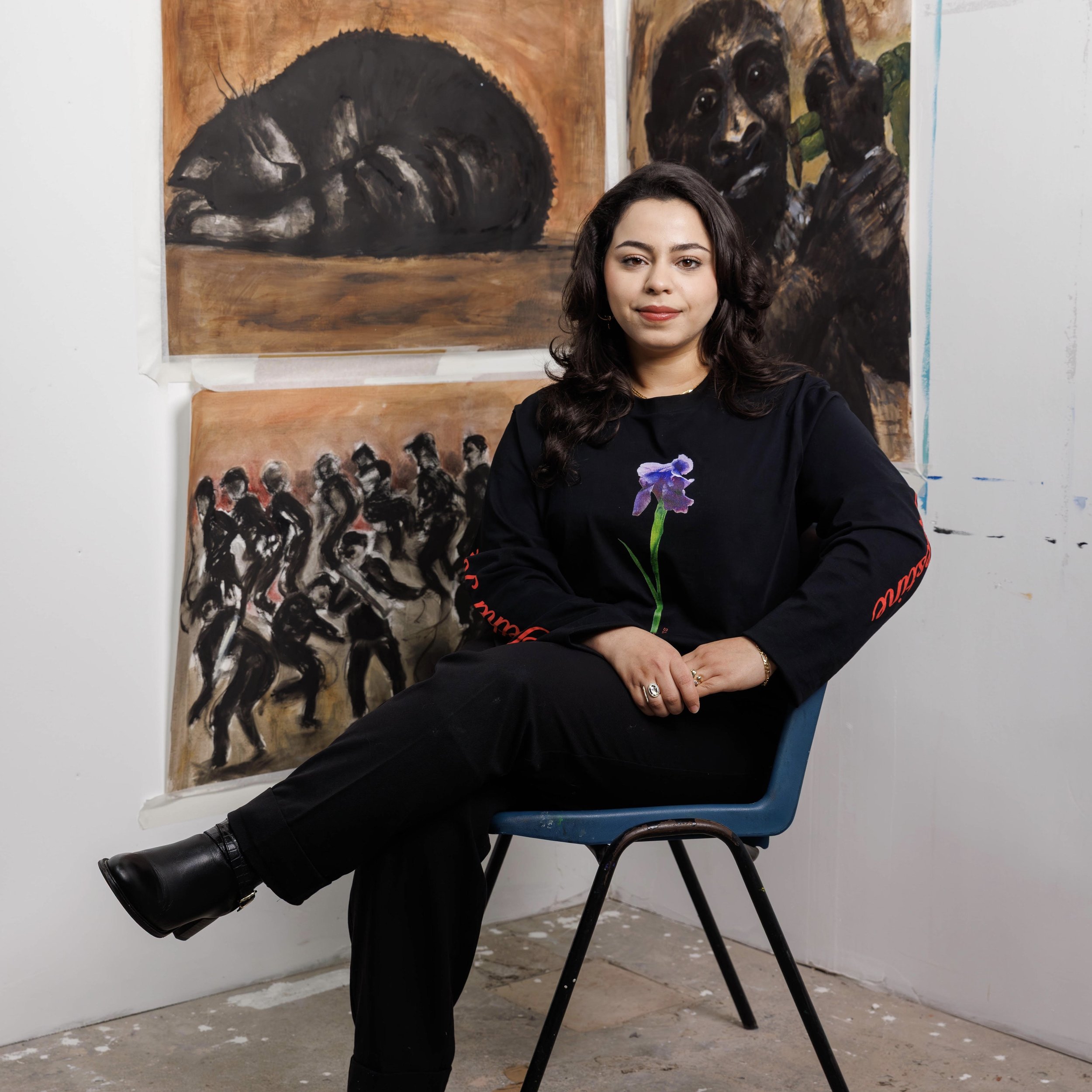 portrait of Palestinian Painter Malak Mattar, work centers around memories and compassion following her exile from Palestine due to the Israeli Occupation.