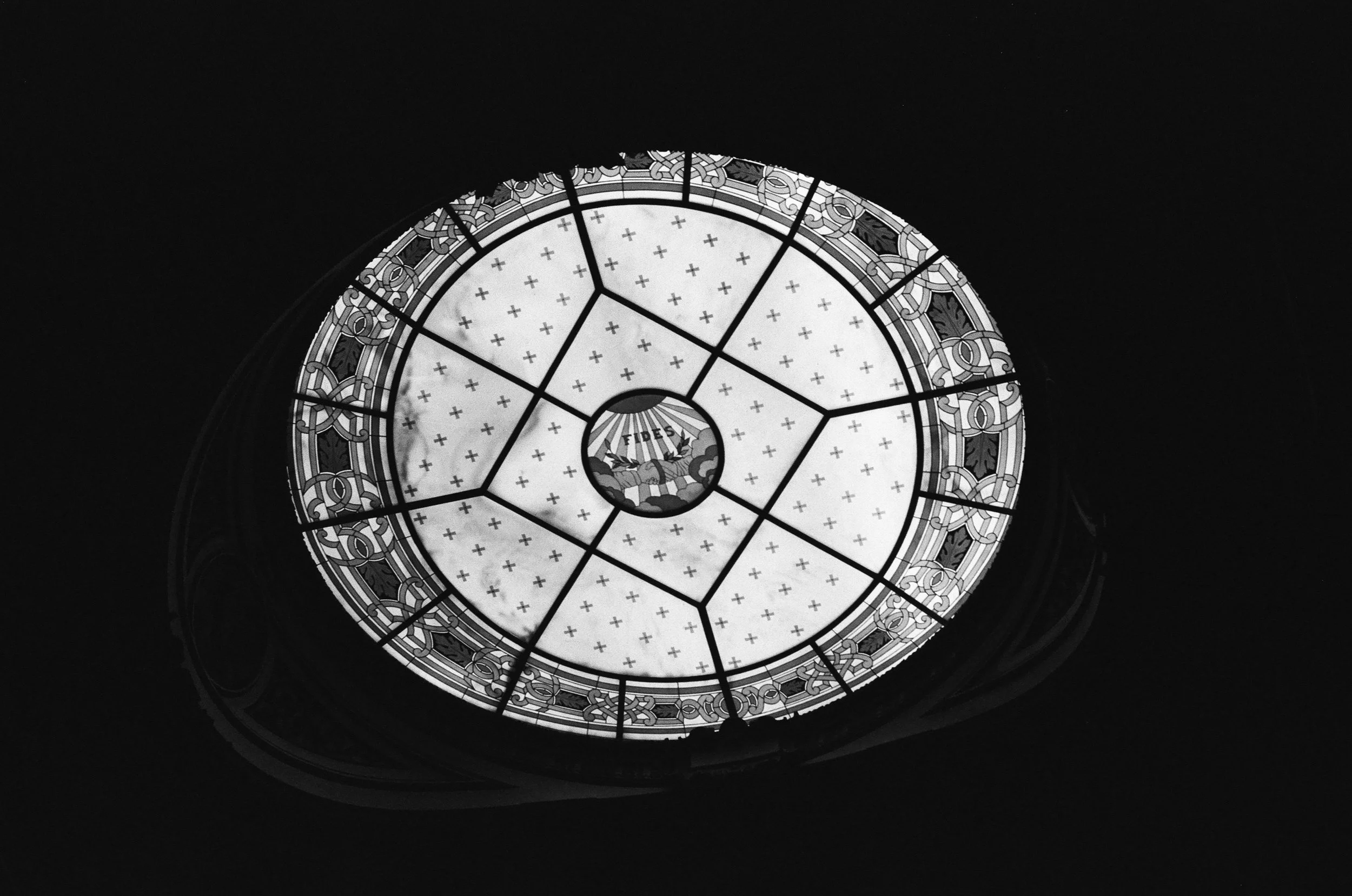 Circular stained-glass dome window inside Berliner Dom