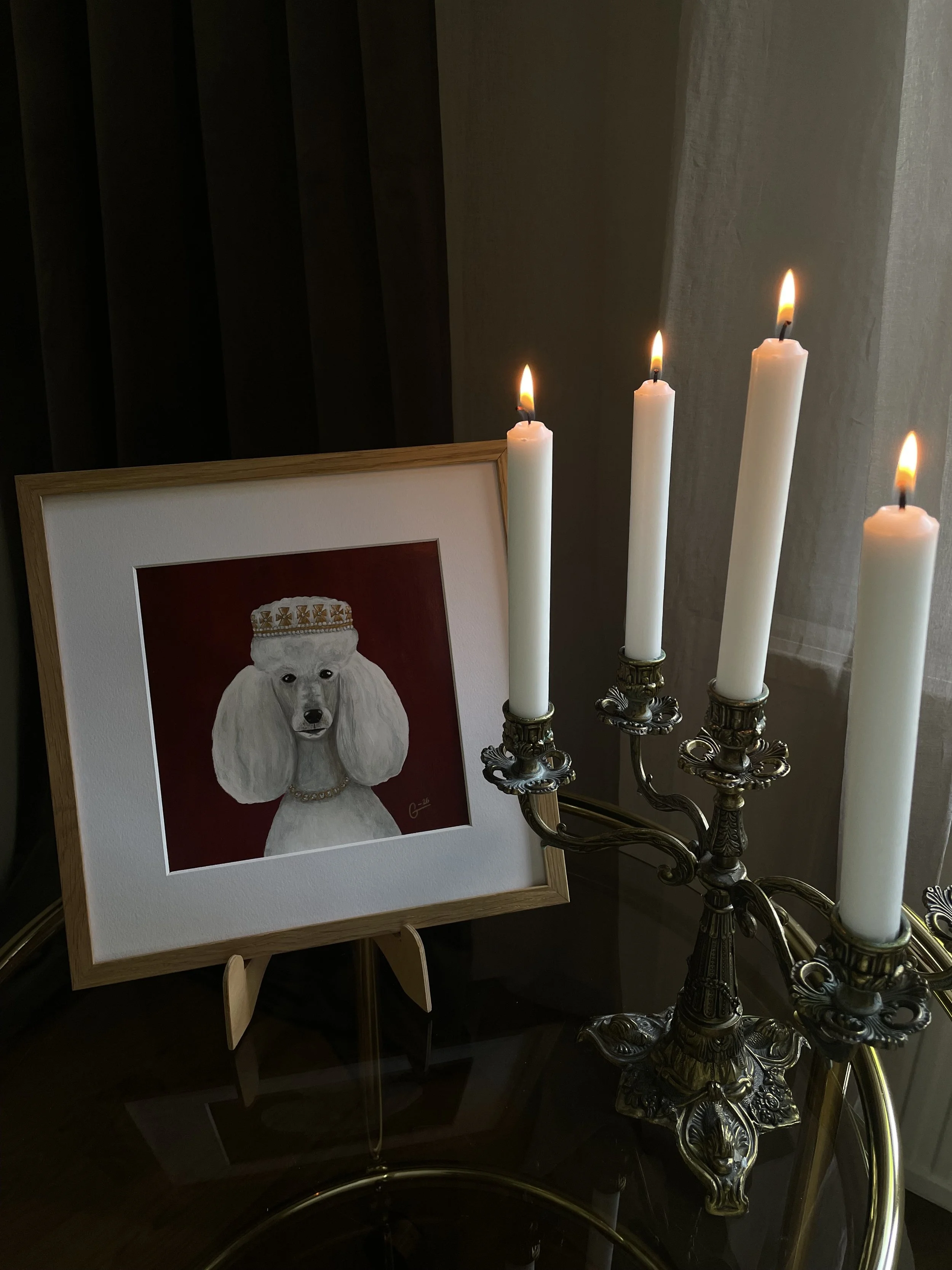 Framed royal dog portrait styled with vintage candlelight.