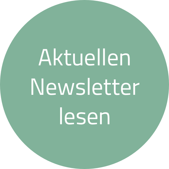 Grüner runder Button mit weißem Text "Aktuellen Newsletter lesen".