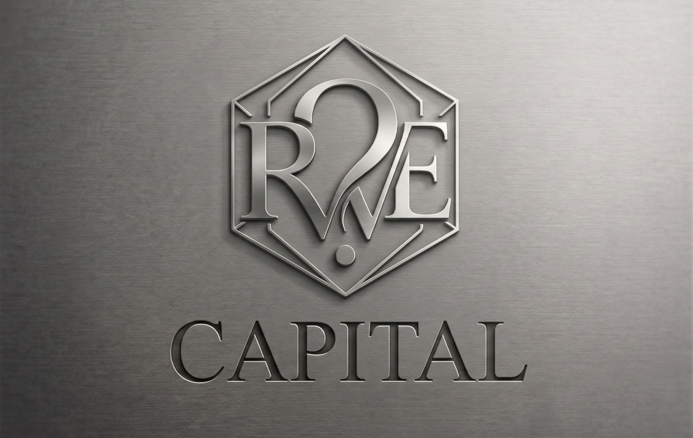 Metal logo with the words 'RWE Capital' and an emblem with the letters 'R', 'W', and 'E' within a hexagon design.