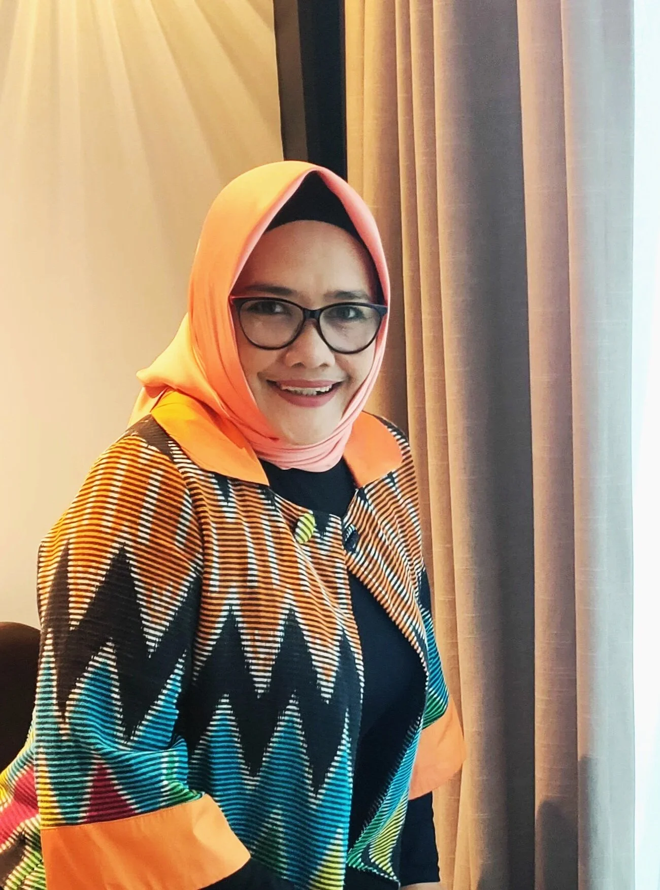 A photograph of Sarva's partner, Hartini Mochtar.