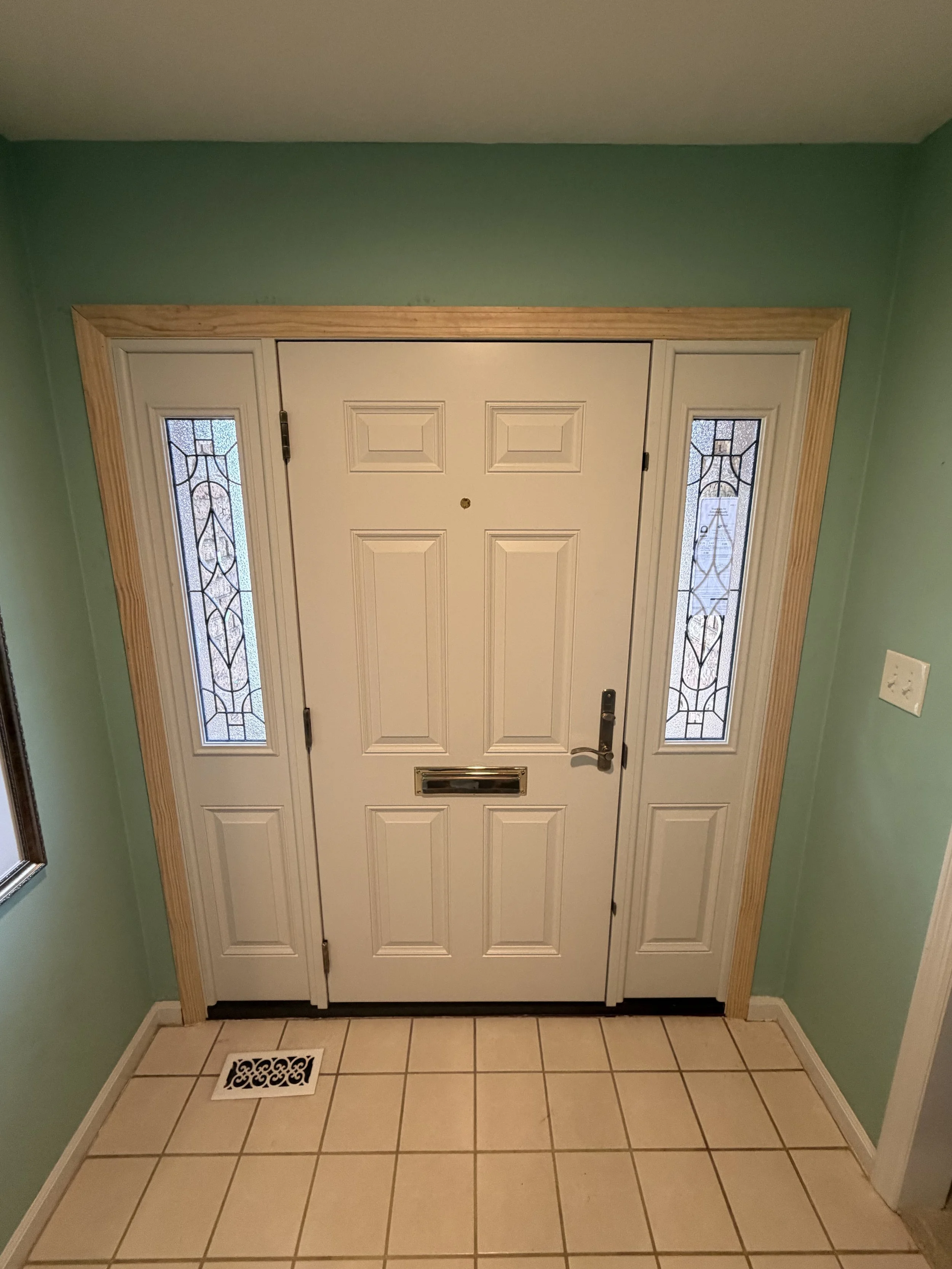 Inside view of new front door, trim insulated and more!