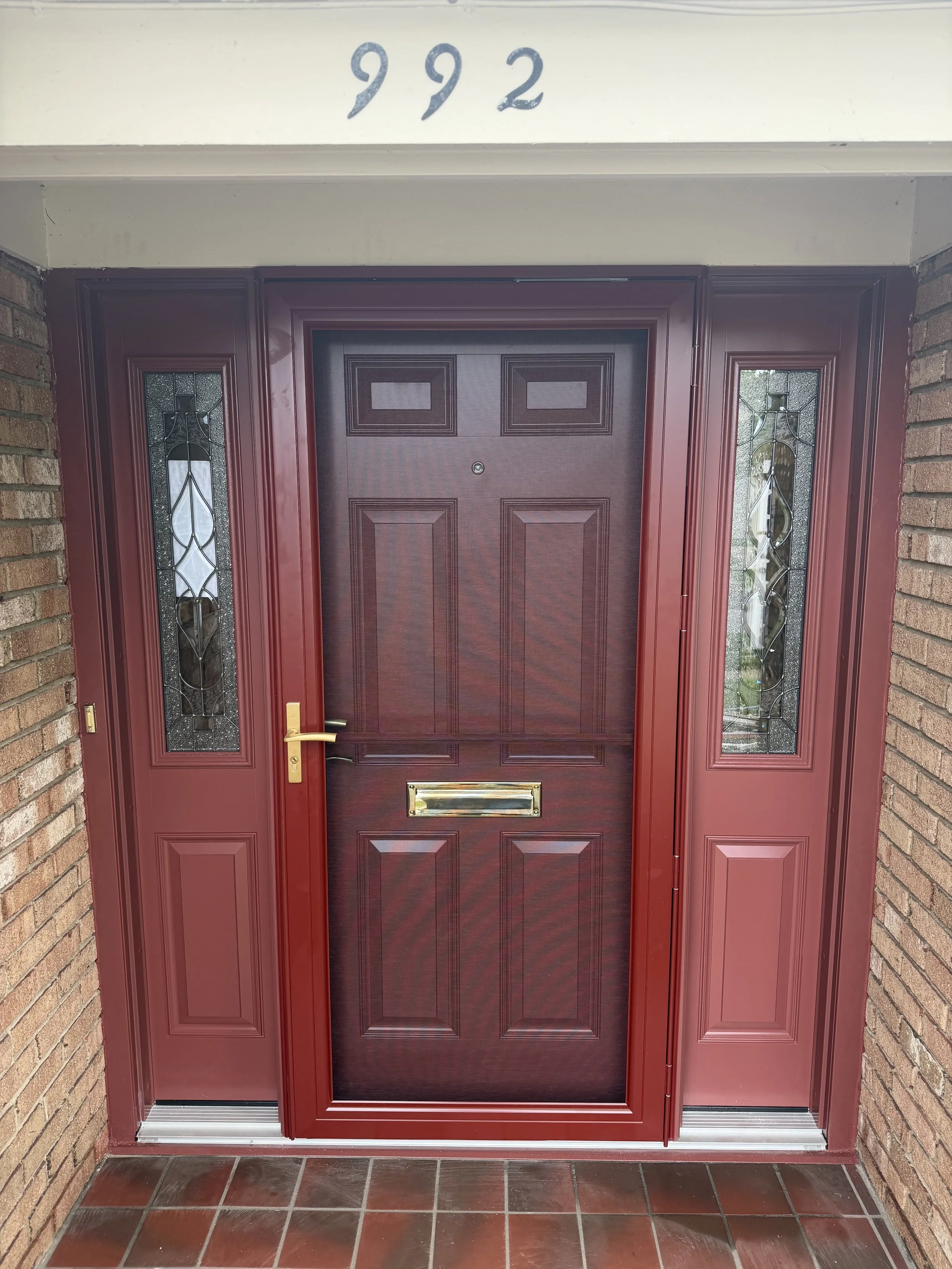 New updated front door with mail slot, sidelights and storm door!