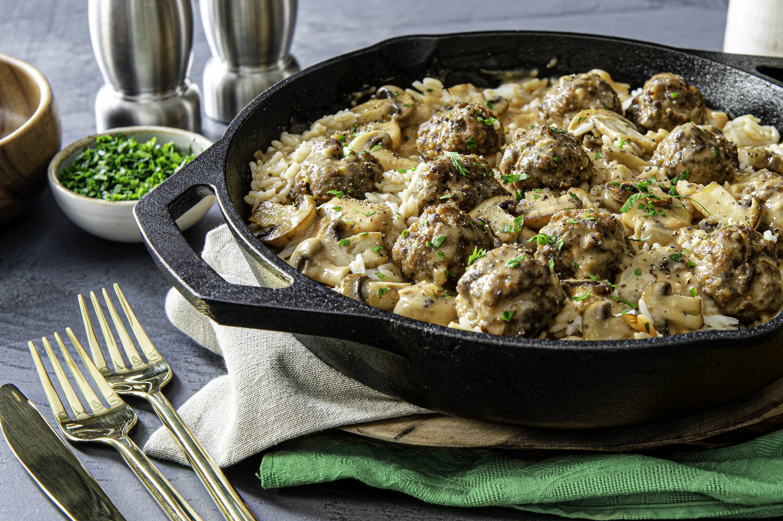  A meatball casserole in a cast iron dish ready to serve family style. Photographed by El Keegan, Dublin Food Photographer.  