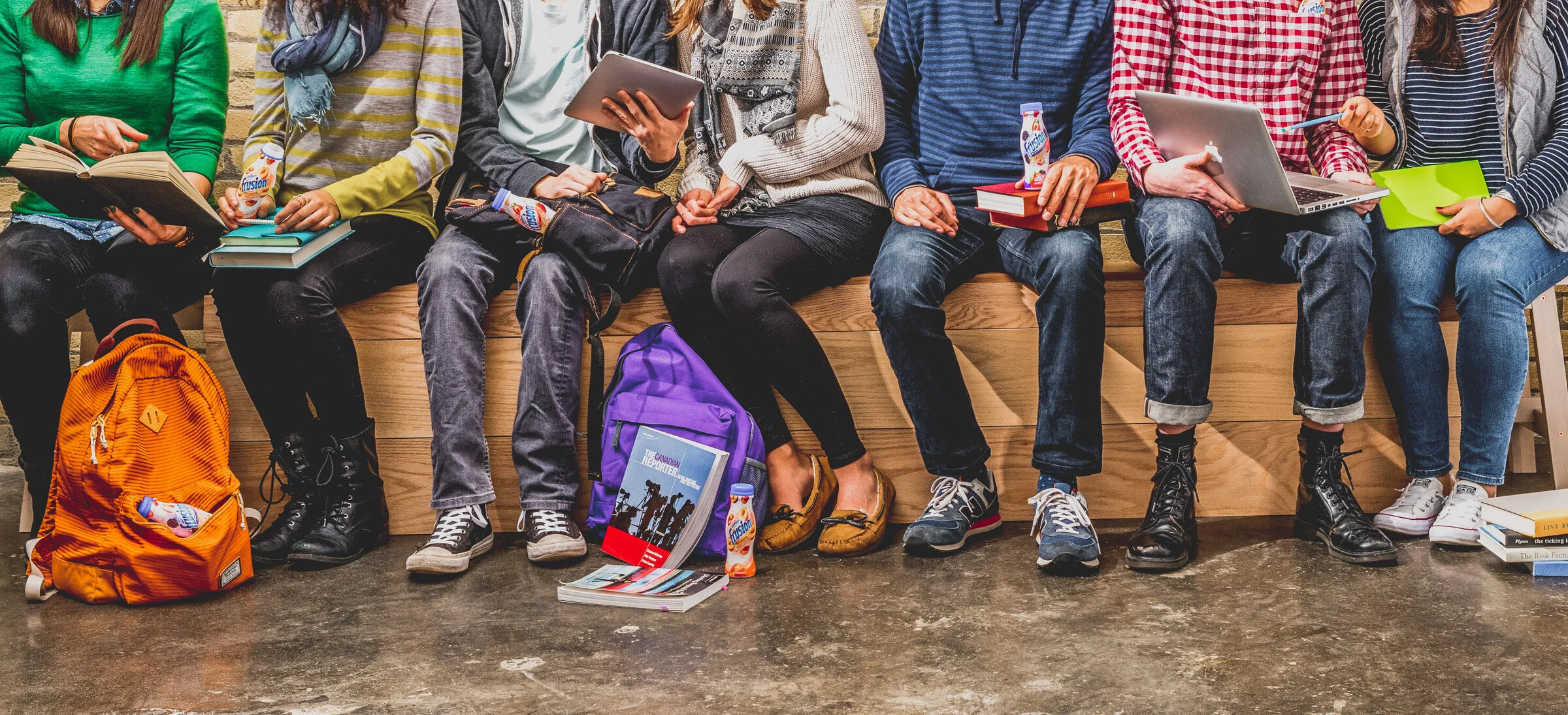  A lifestyle photograph of students sitting on a school bench. Commercial photography by El Keegan, Dublin, Ireland.  