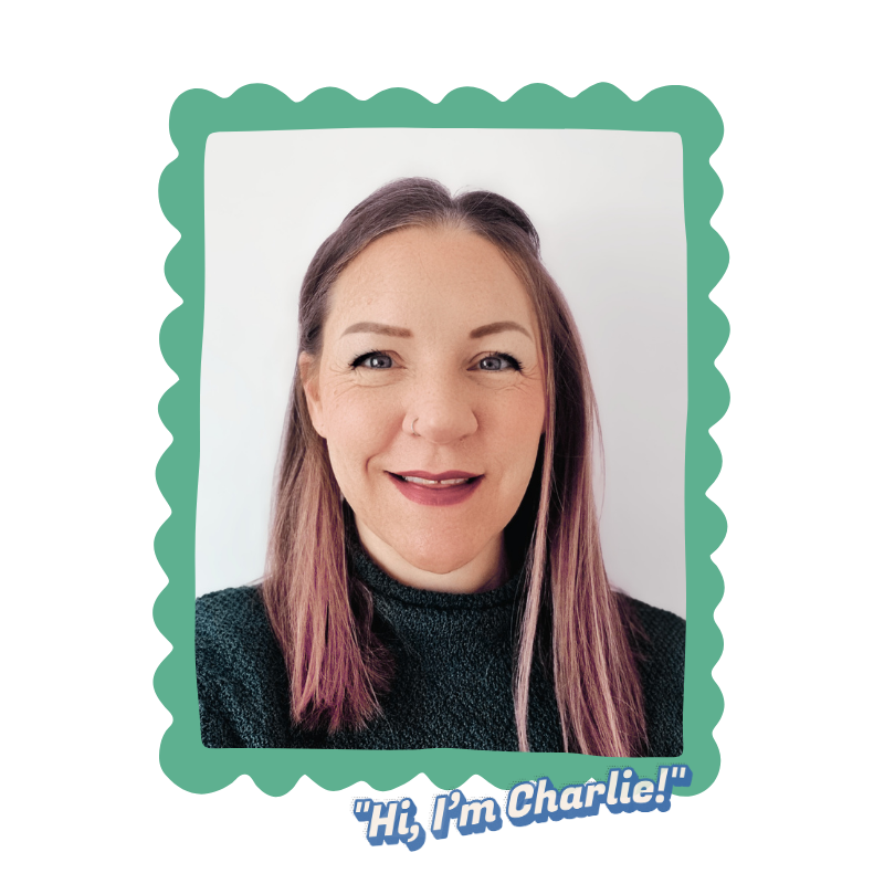 A woman with long brown and purple hair smiling at the camera, wearing a dark sweater, with a white background and a green futuristic frame around the portrait, and the text 'Hi, I’m Charlie!' at the bottom.
