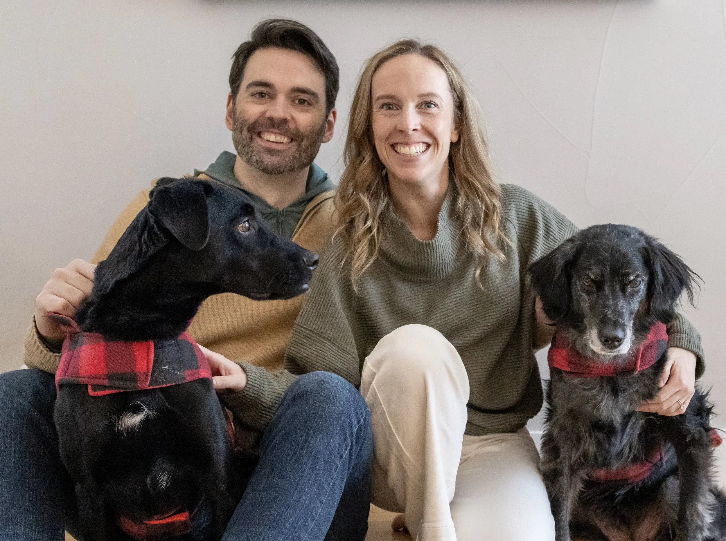 Dr. Emma with husband and 2 dogs when not in the clinic treatment pelvic health