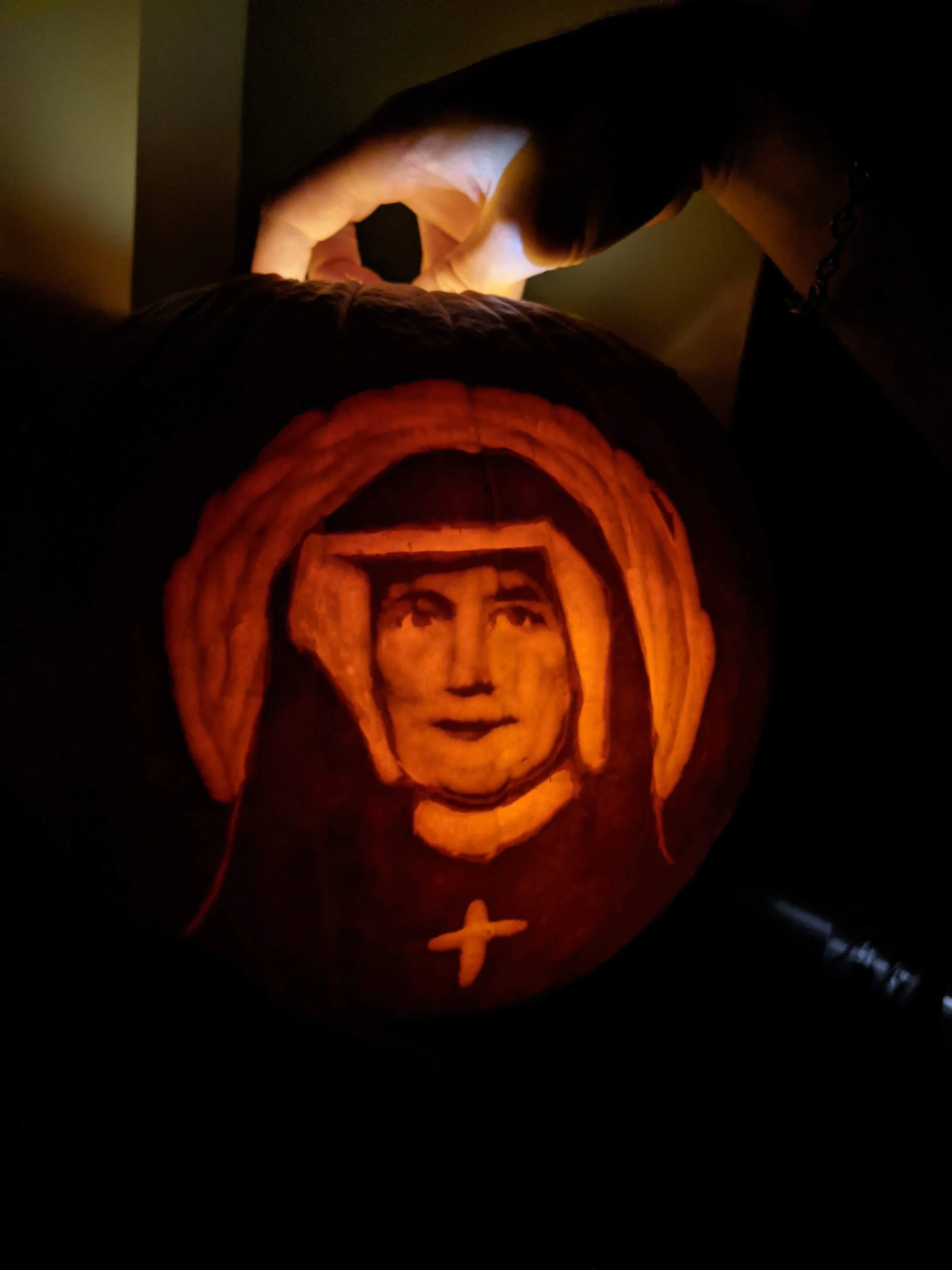 A pumpkin carving of St. Faustina from 2022