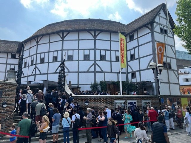 This is an exterior photograph of Shakespeare's famous Globe Theater in London, England.